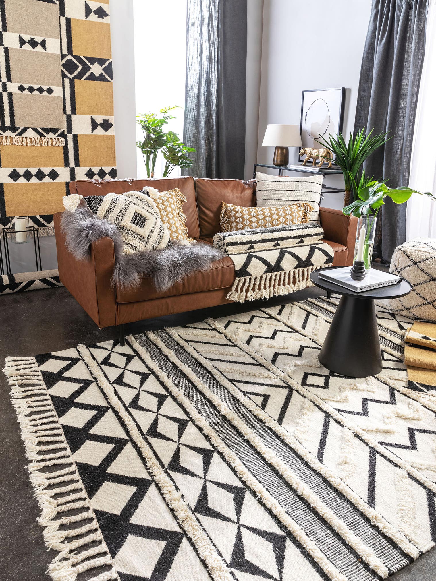 Teppich aus 80% Wolle, 20% Baumwolle in Schwarz/Weiß mit 6 bis 10 mm hohem Flor von benuta Pure