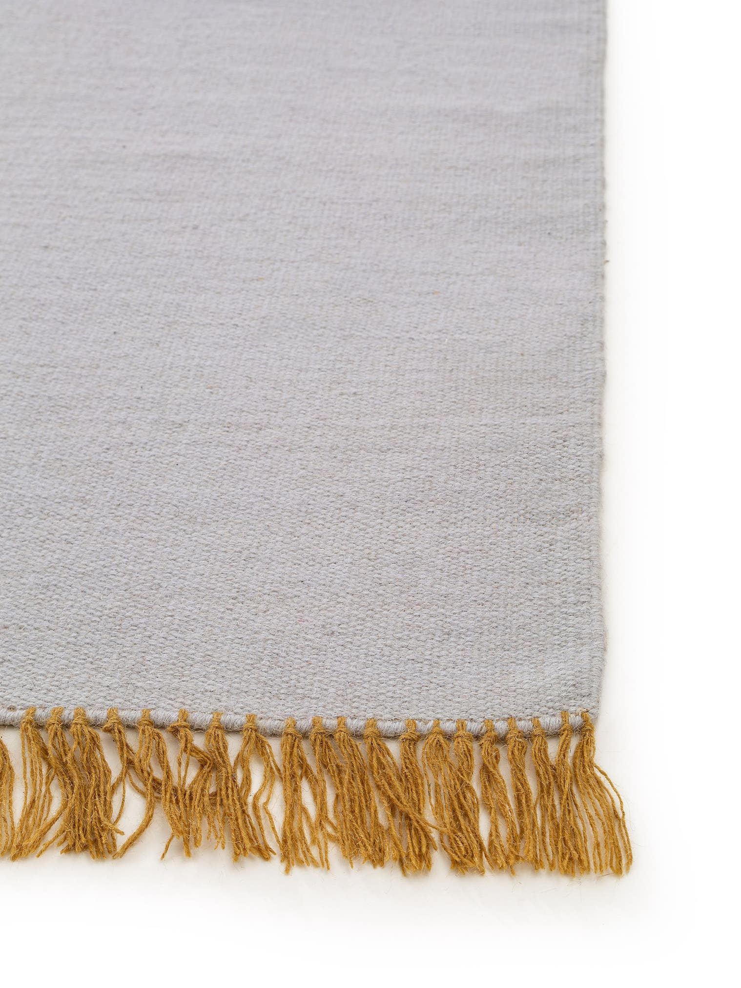 Teppich aus 90% Wolle, 10% Baumwolle in Grau mit bis 5 mm hohem Flor von benuta Pop