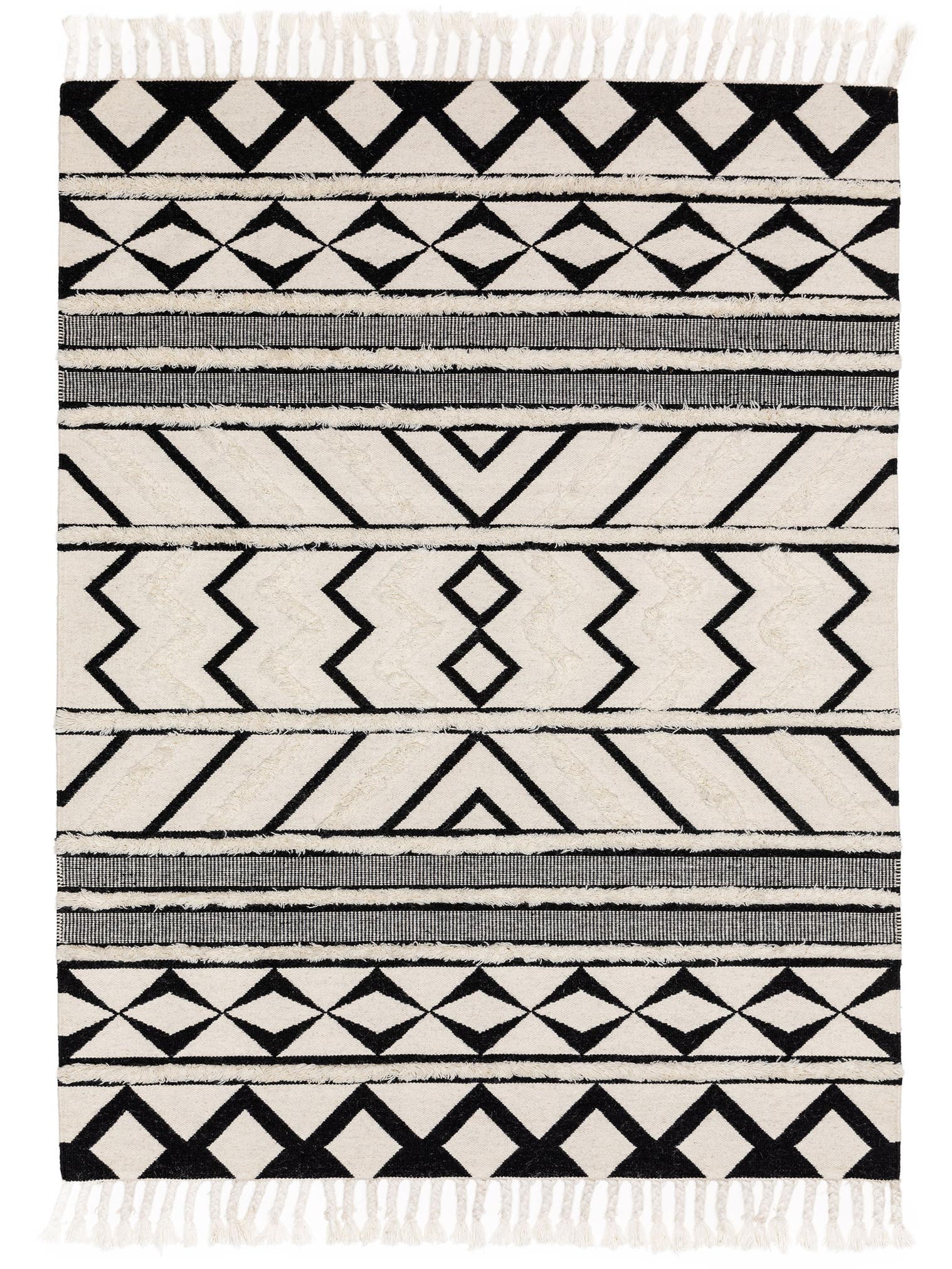 Teppich aus 80% Wolle, 20% Baumwolle in Schwarz/Weiß mit 6 bis 10 mm hohem Flor von benuta Pure