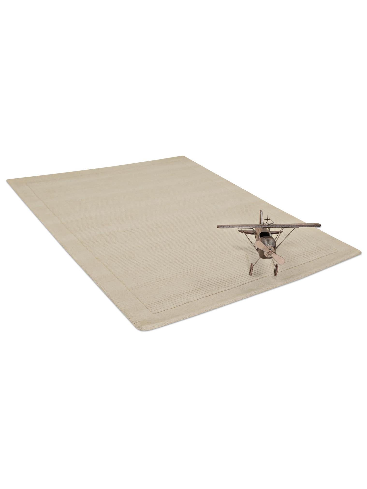 Teppich aus 100% Wolle in Beige mit 6 bis 10 mm hohem Flor von benuta