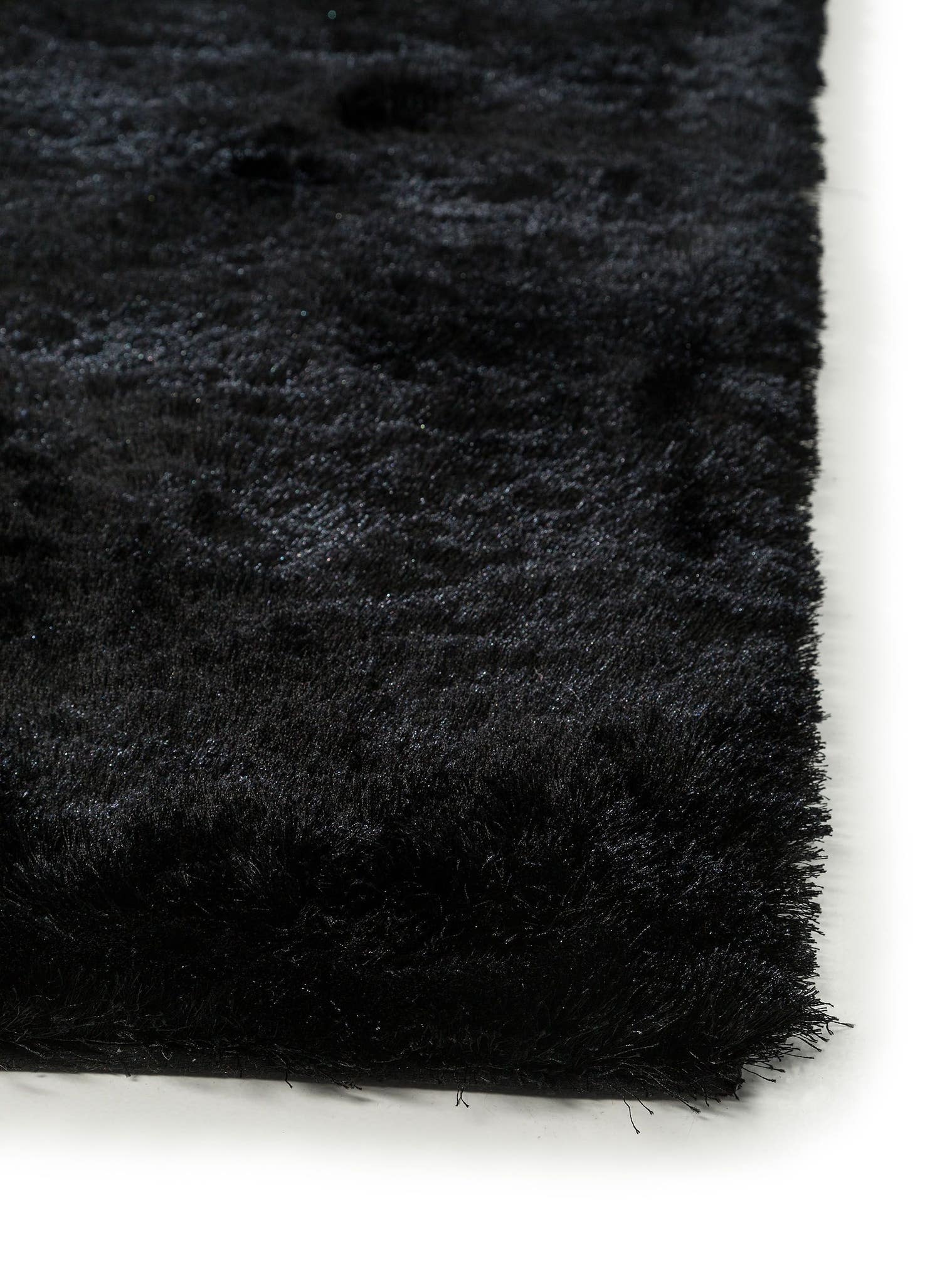 Rug made of 100% Polyester in Black with a 31 - 40 mm high pile by benuta Nest
