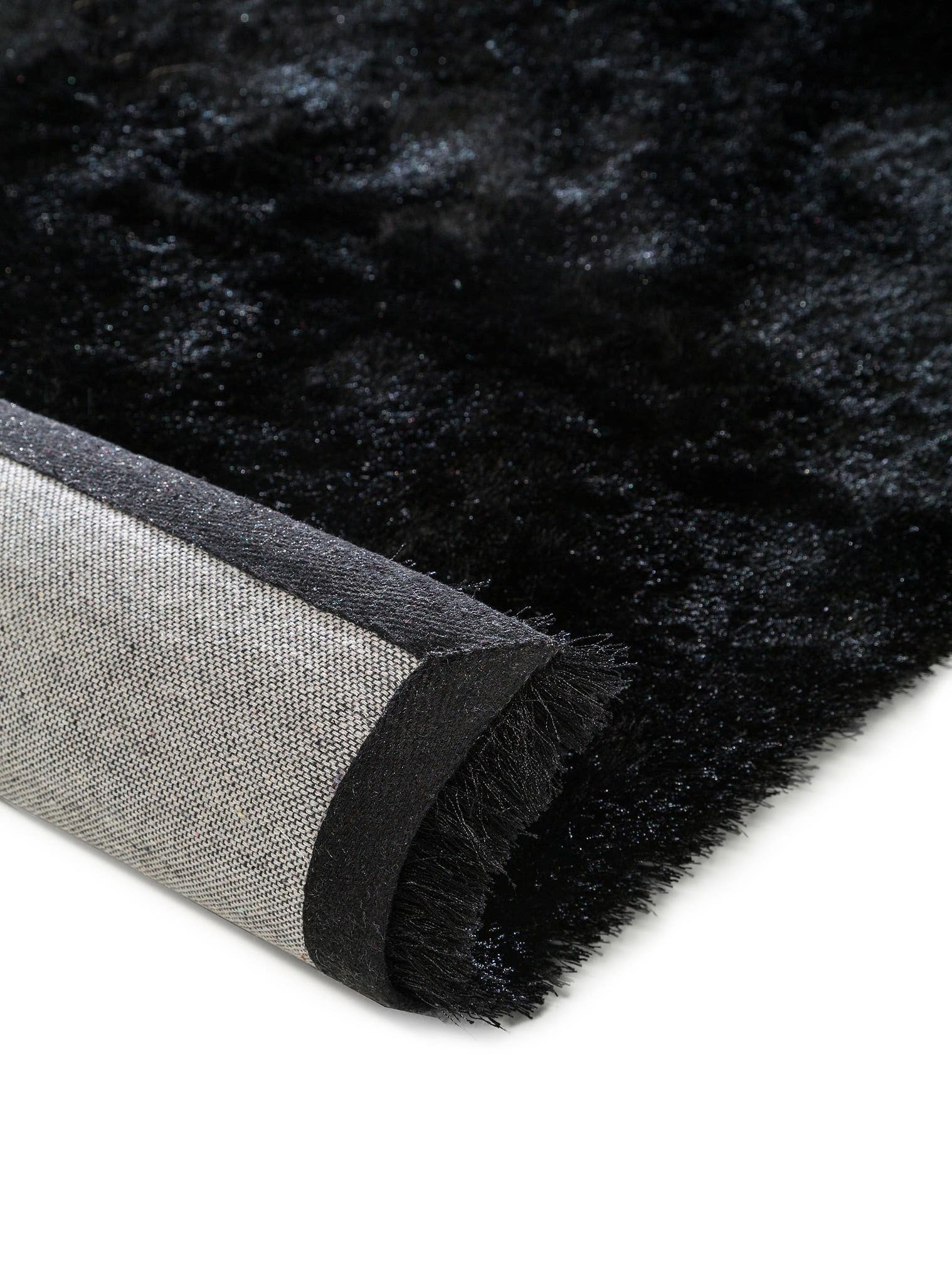 Rug made of 100% Polyester in Black with a 31 - 40 mm high pile by benuta Nest