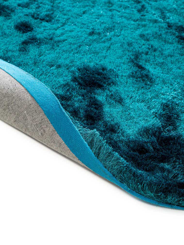 Teppich aus 100% Polyester in Türkis mit 31 bis 40 mm hohem Flor von benuta Nest