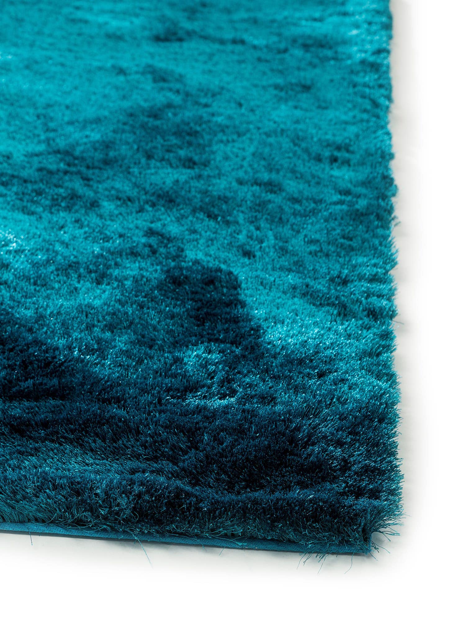 Rug made of 100% Polyester in Turquoise with a 31 - 40 mm high pile by benuta Nest