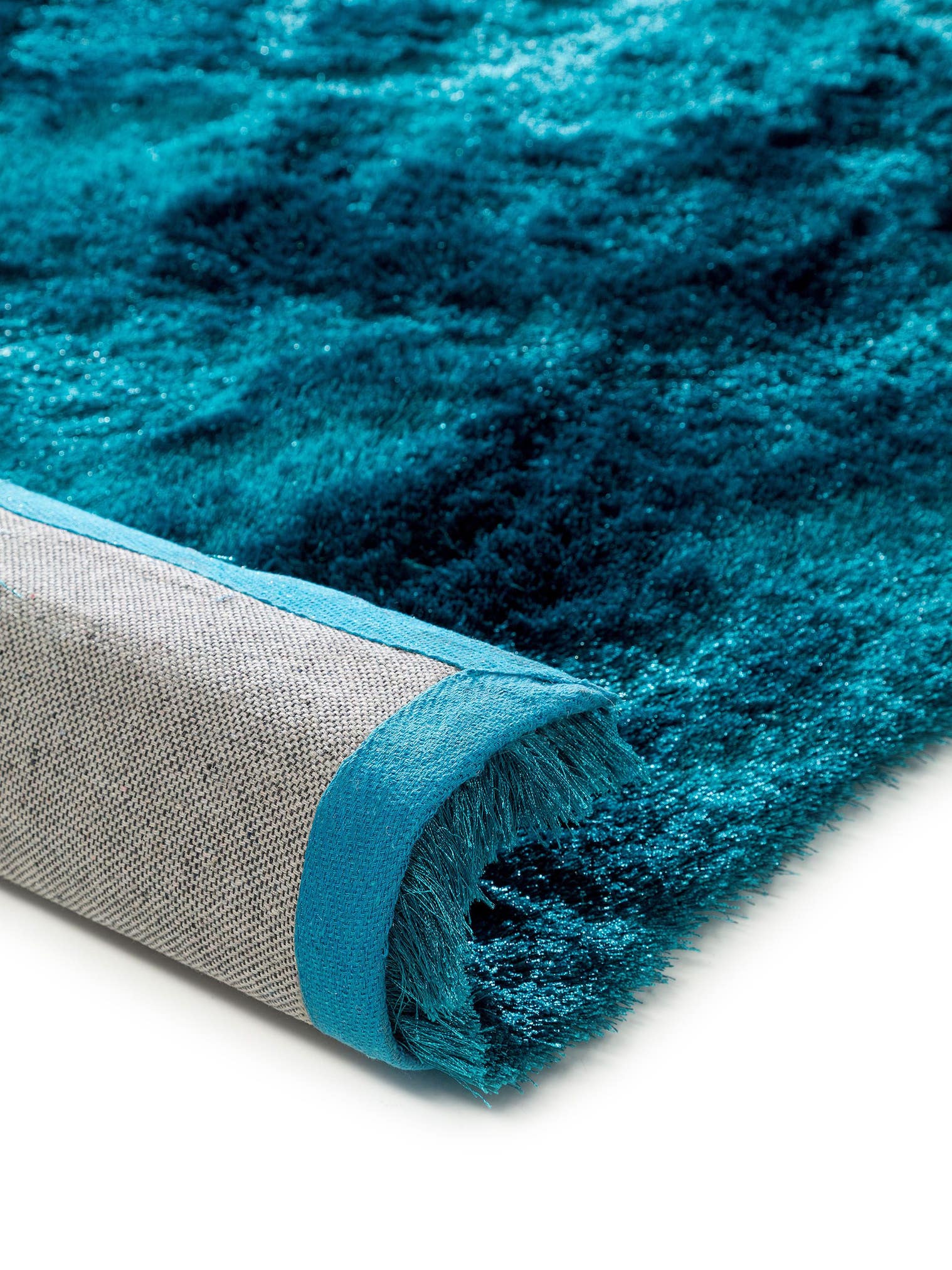 Rug made of 100% Polyester in Turquoise with a 31 - 40 mm high pile by benuta Nest