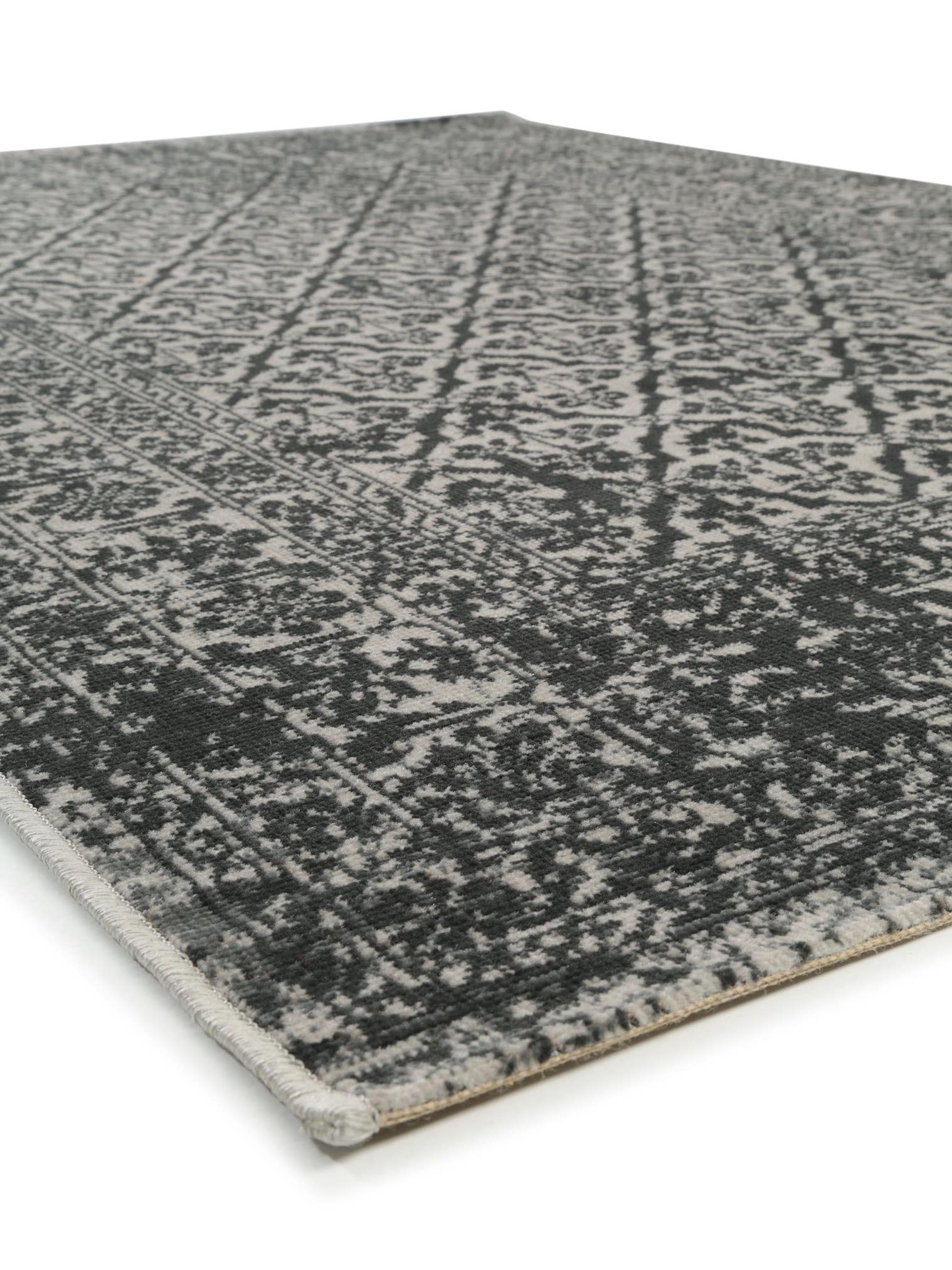 Rug made of 100% Polypropylene in Black/White with a 1- 5 mm high pile by benuta Nest