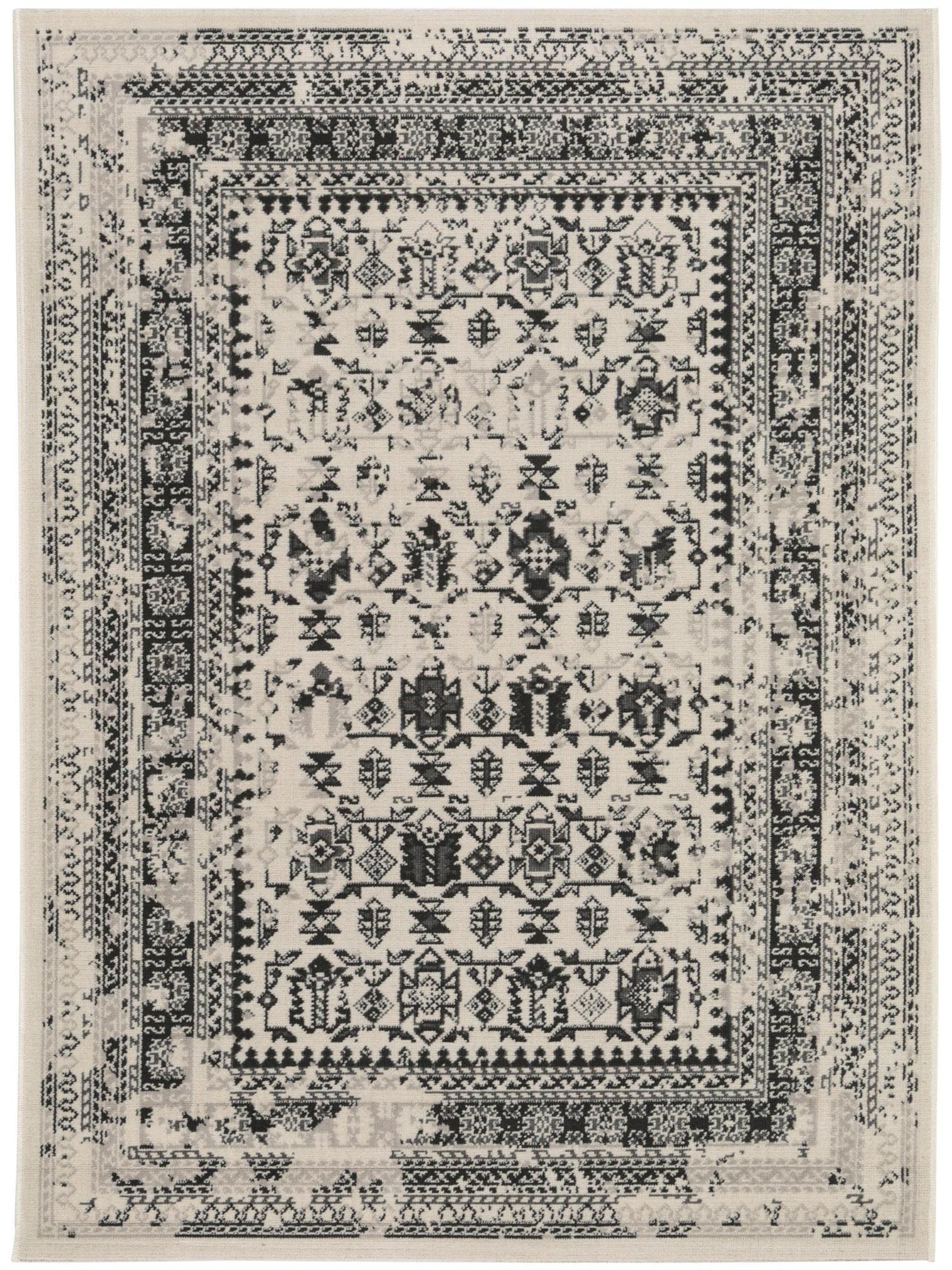 Teppich aus 100% Polypropylen in Schwarz/Weiß mit bis 5 mm hohem Flor von benuta Nest