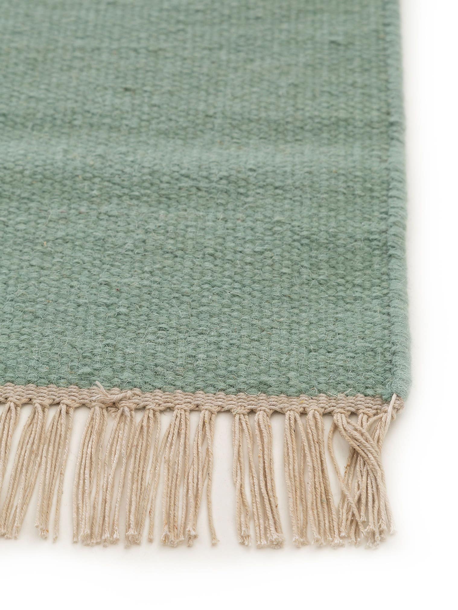 Teppich aus 80% Wolle, 20% Baumwolle in Grün mit bis 5 mm hohem Flor von benuta Pop