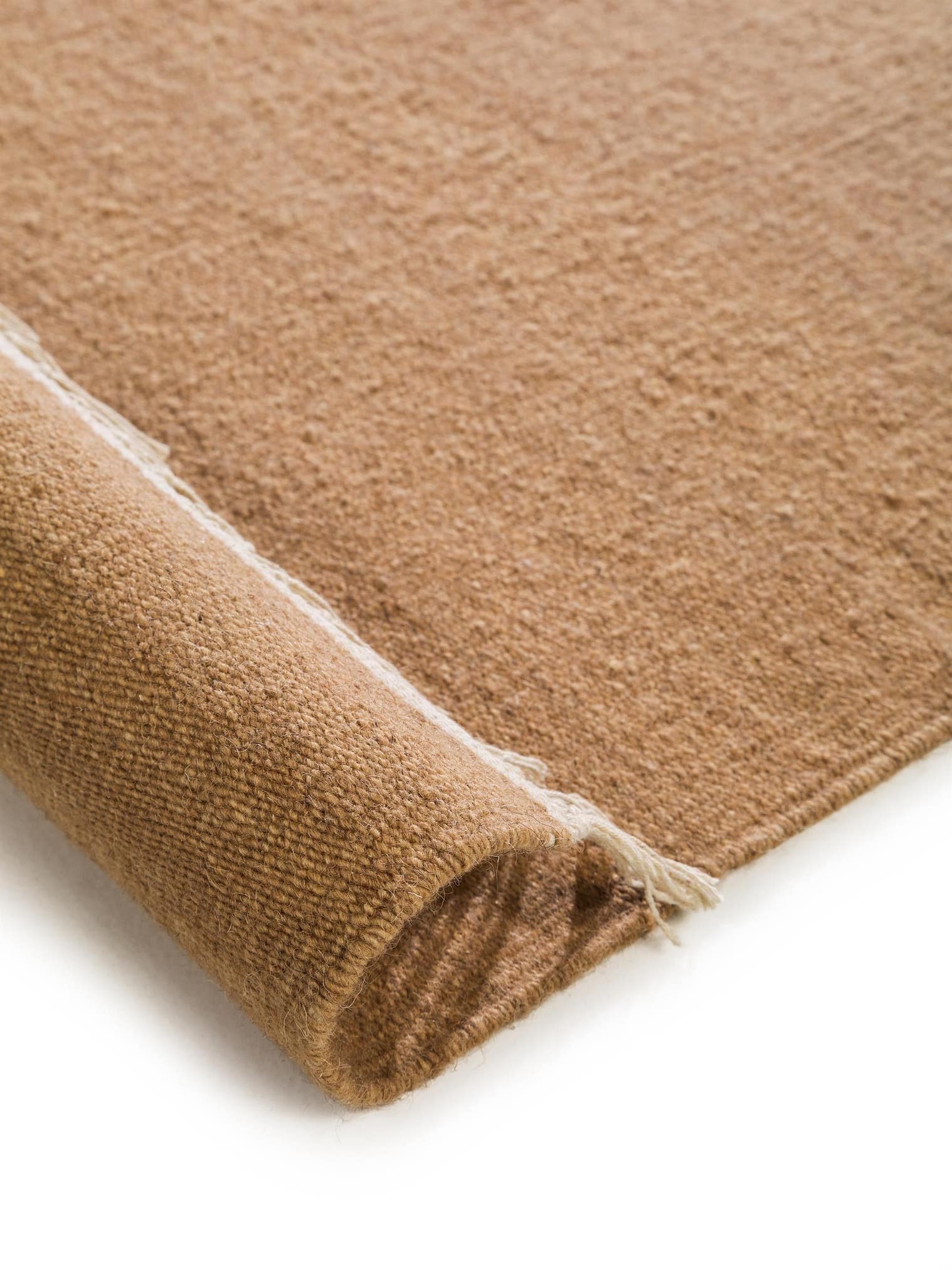 Teppich aus 100% Wolle in Braun mit bis 5 mm hohem Flor von benuta