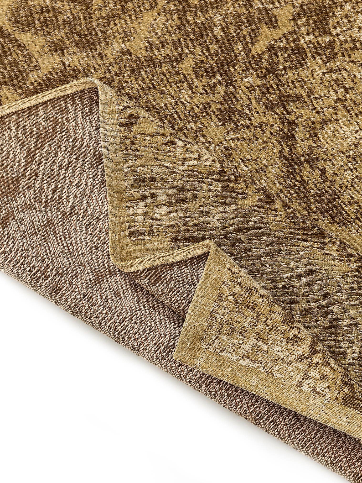 Teppich aus 55% Polyacryl, 27% Polyester, 17% Baumwolle, 1% Latex in Braun mit bis 5 mm hohem Flor von benuta Nest