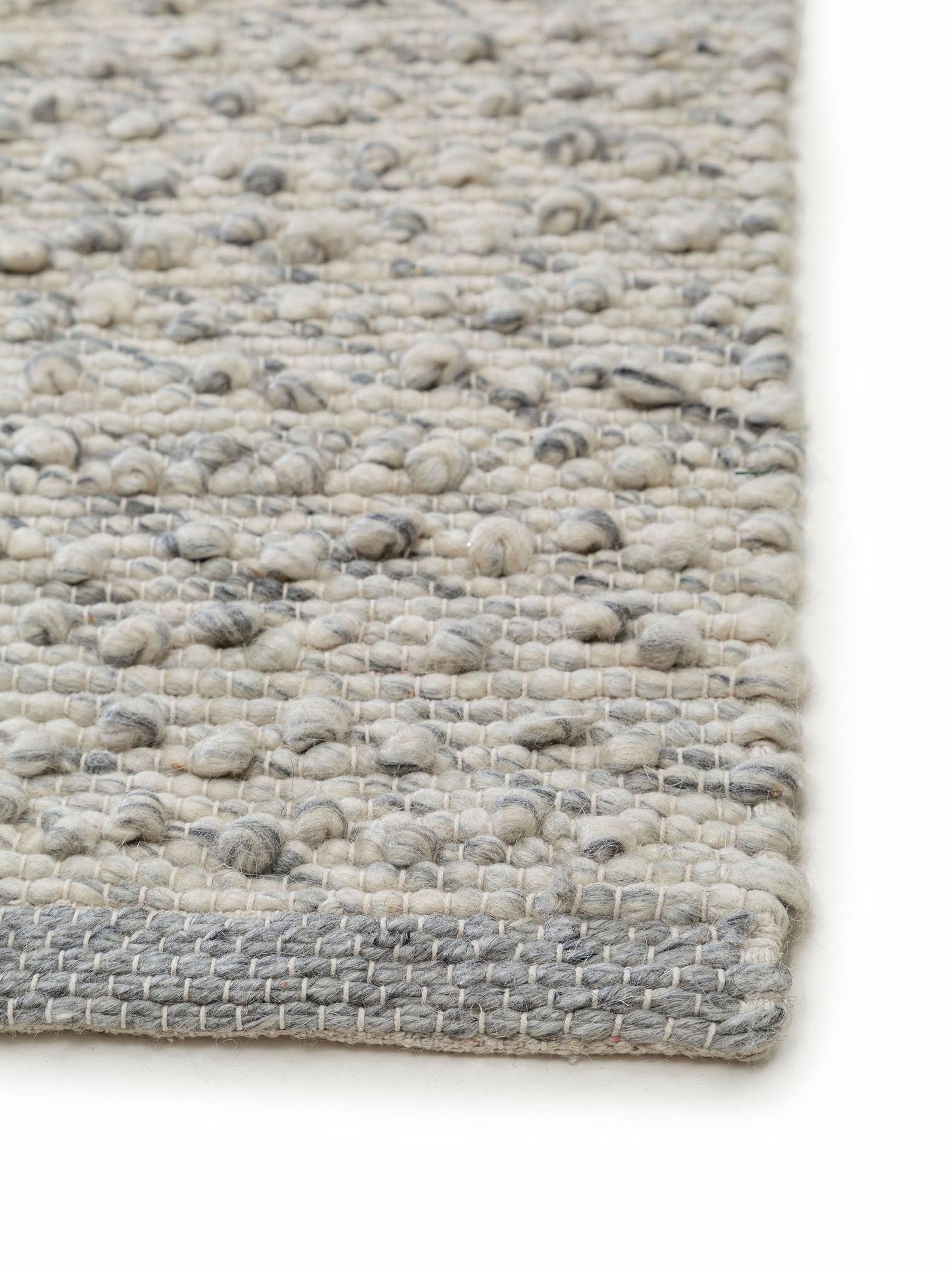 Tapijt van 40% Wol, 30% Katoen, 20% Polyester, 10% Viscose in Grijs met een 1- 5 mm hoge pool van benuta Pure