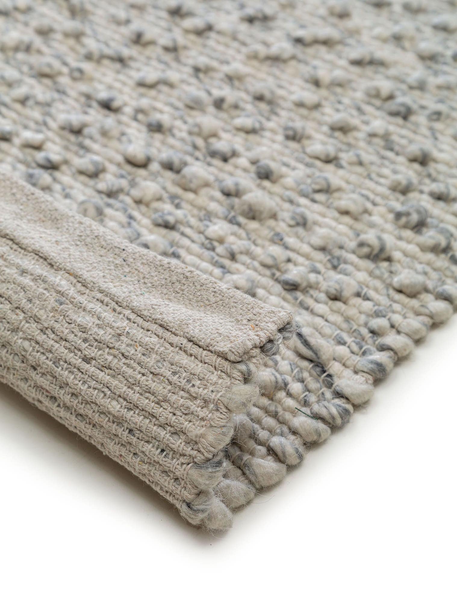 Tapijt van 40% Wol, 30% Katoen, 20% Polyester, 10% Viscose in Grijs met een 1- 5 mm hoge pool van benuta Pure