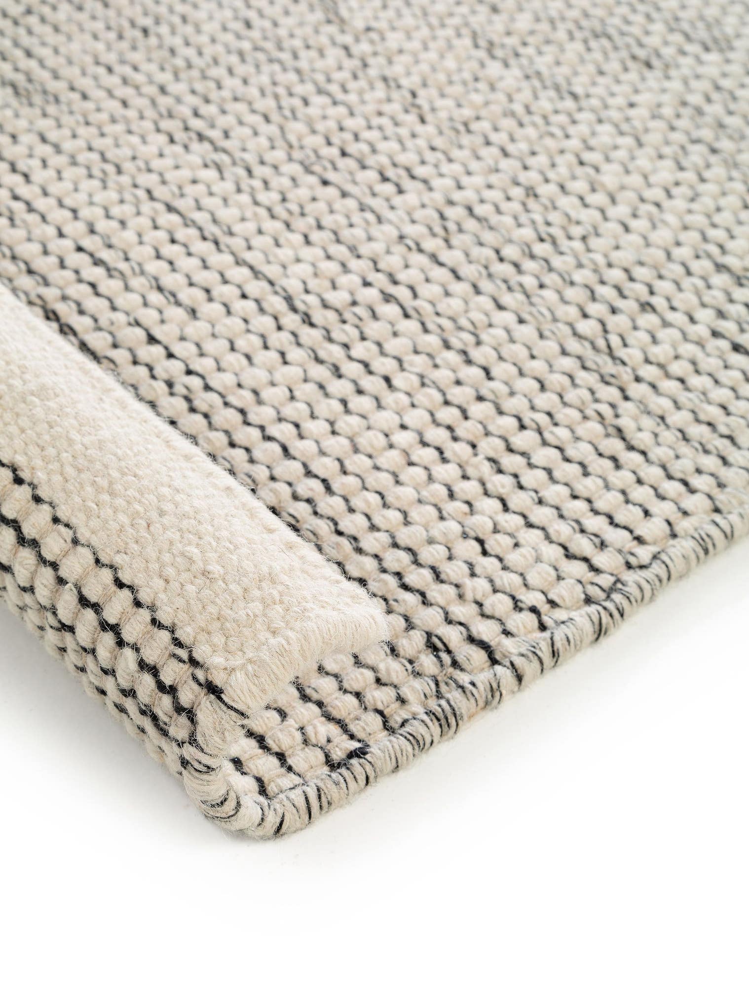 Rug made of 80% wool, 20% cotton in Beige with a 1- 5 mm high pile by benuta Pure