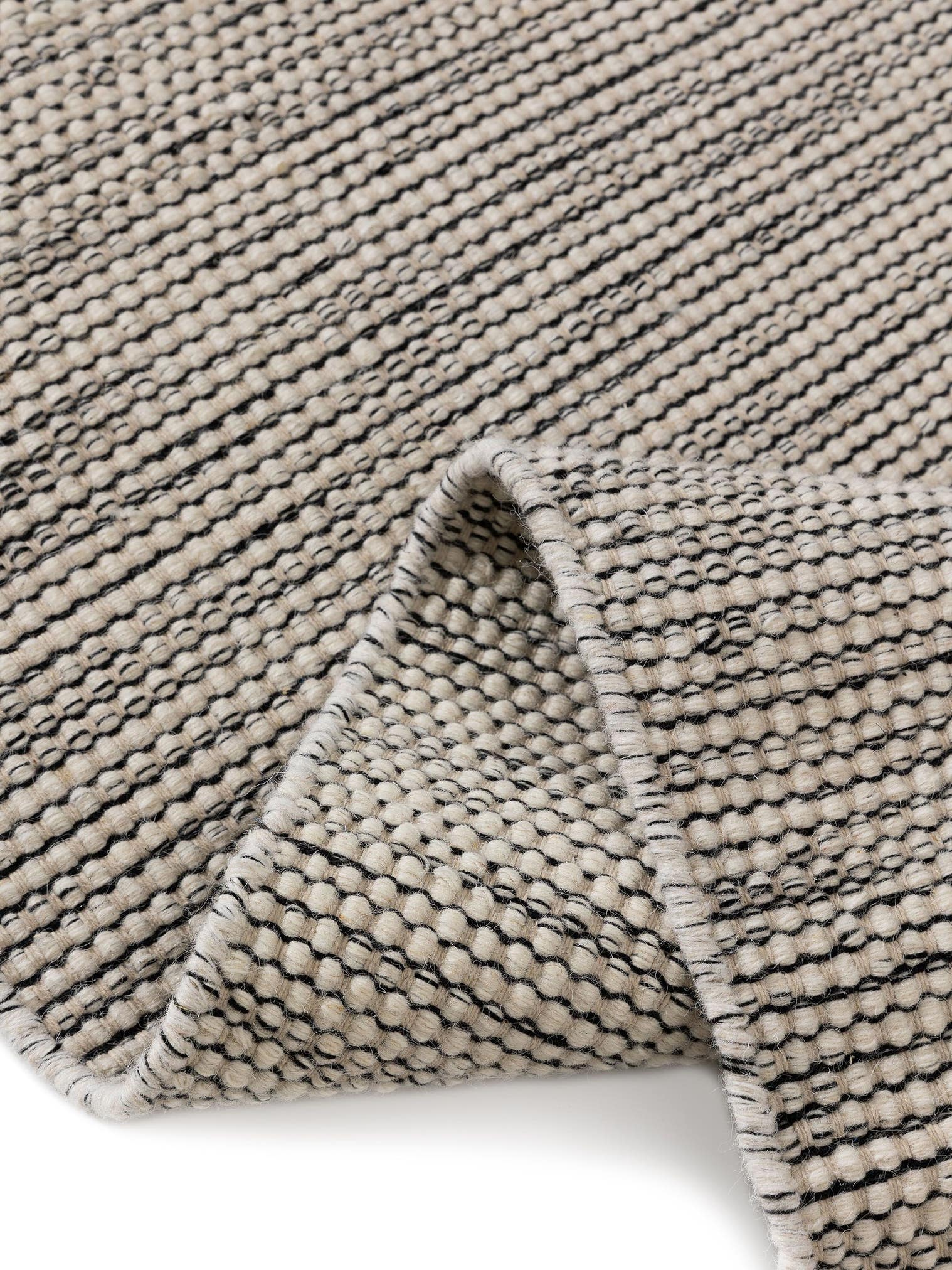 Teppich aus 80% Wolle, 20% Baumwolle in Beige mit bis 5 mm hohem Flor von benuta Pure