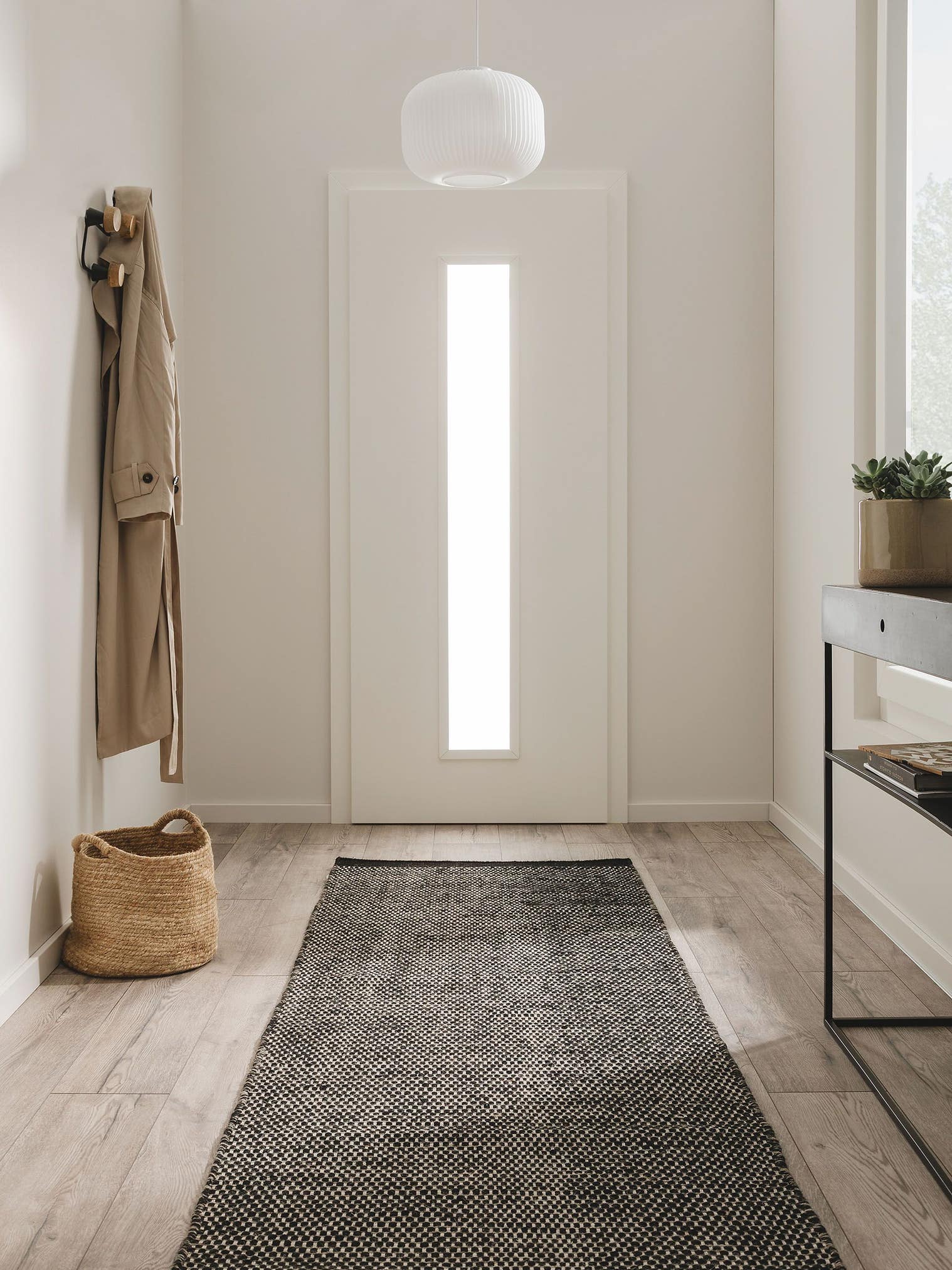 Rug made of 80% wool, 20% cotton in Black/White with a 1- 5 mm high pile by benuta Pure