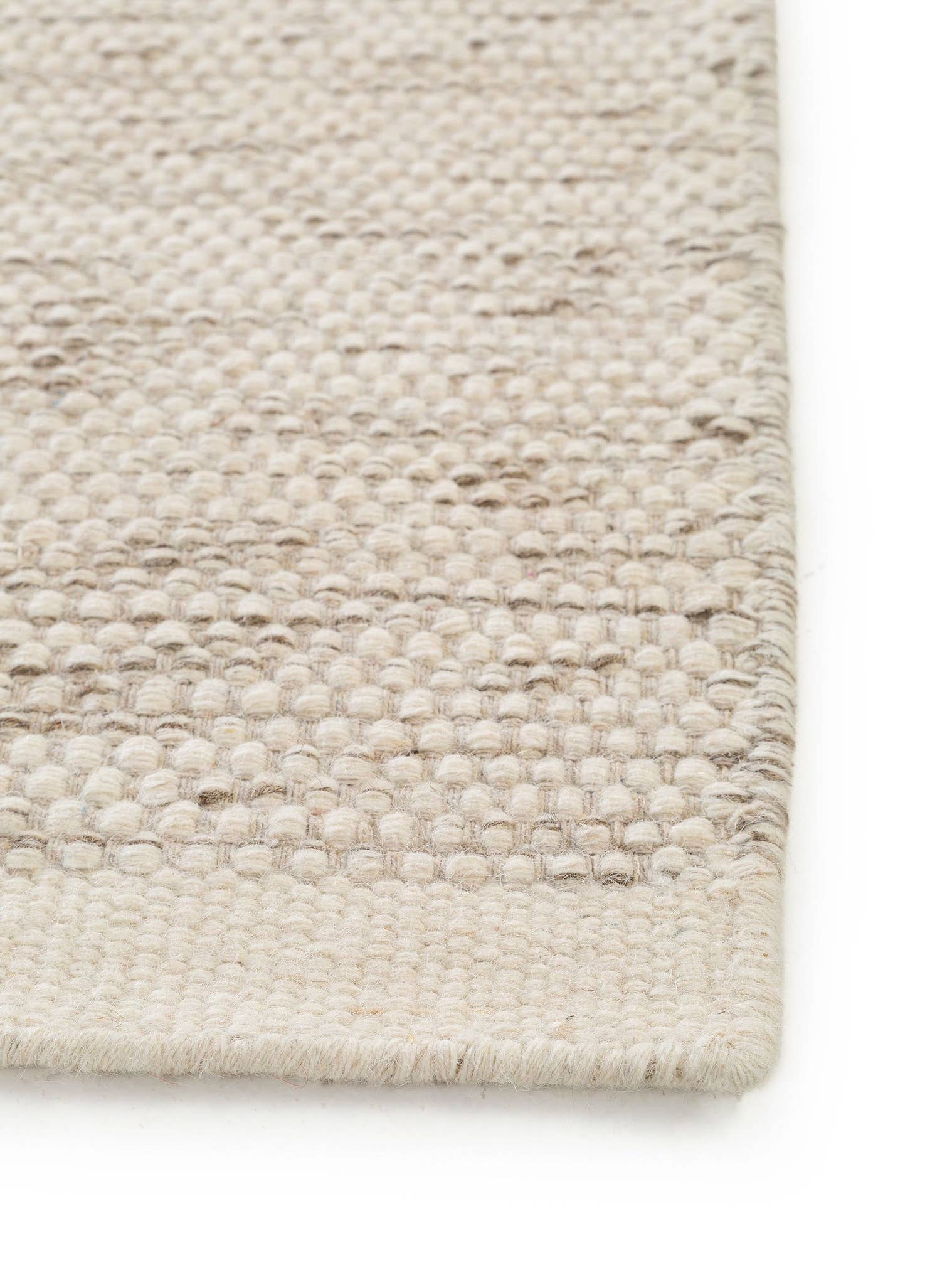 Teppich aus 80% Wolle, 20% Baumwolle in Beige mit bis 5 mm hohem Flor von benuta Pure