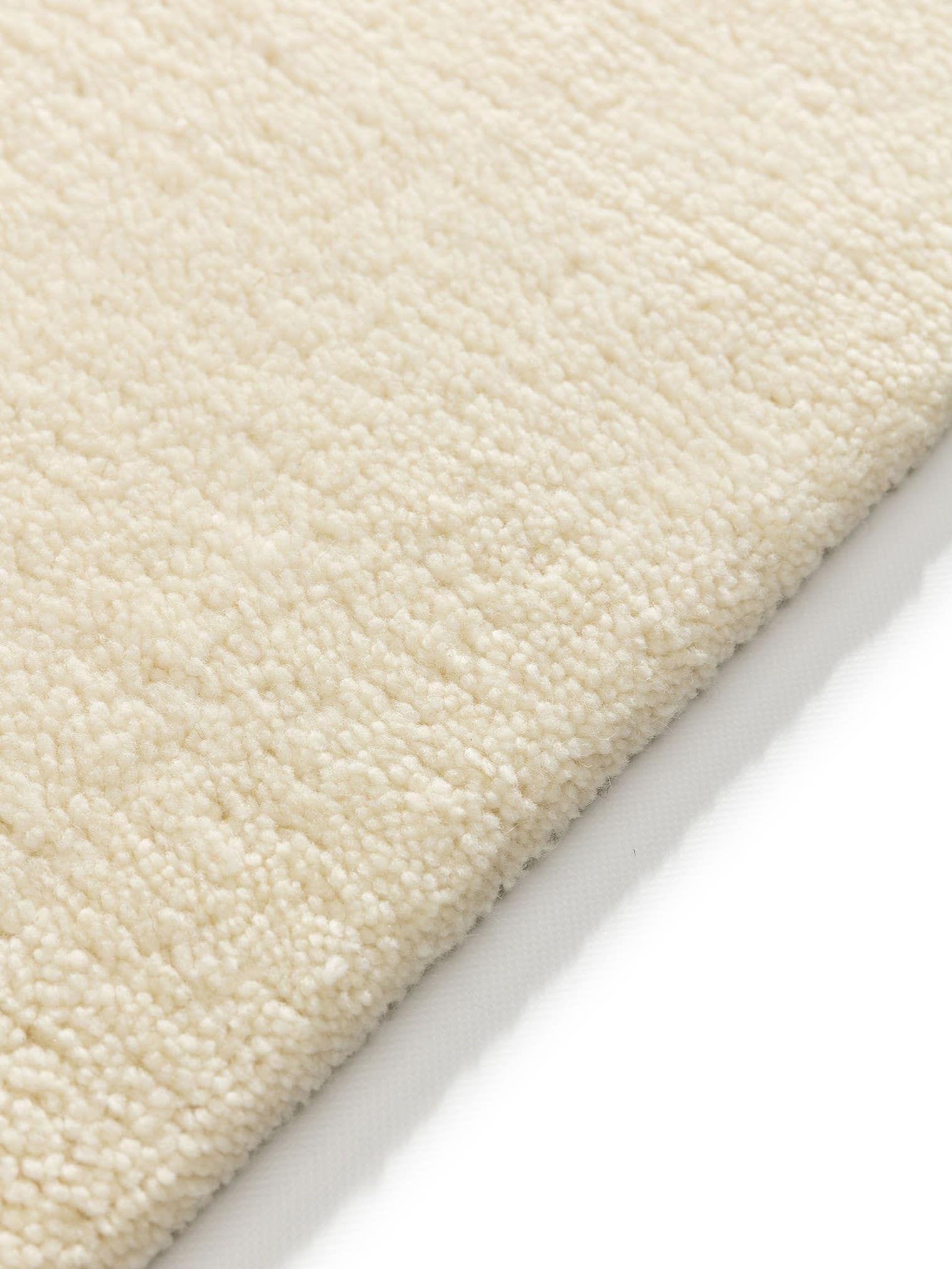 Teppich aus 100% Wolle in Beige mit 31 bis 40 mm hohem Flor von benuta Pure