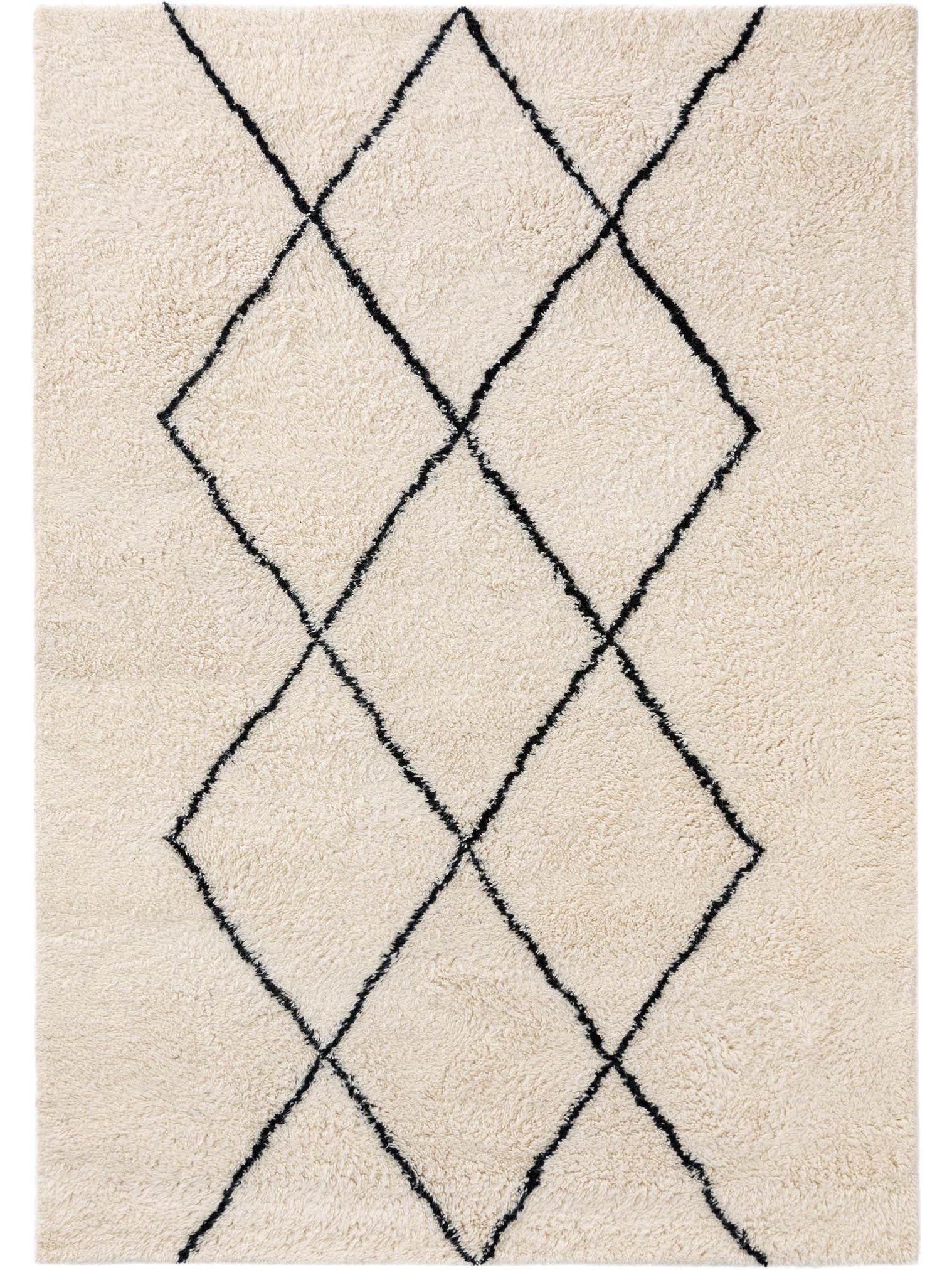 Rug made of 100% Wool in Beige with a 31 - 40 mm high pile by benuta Pure
