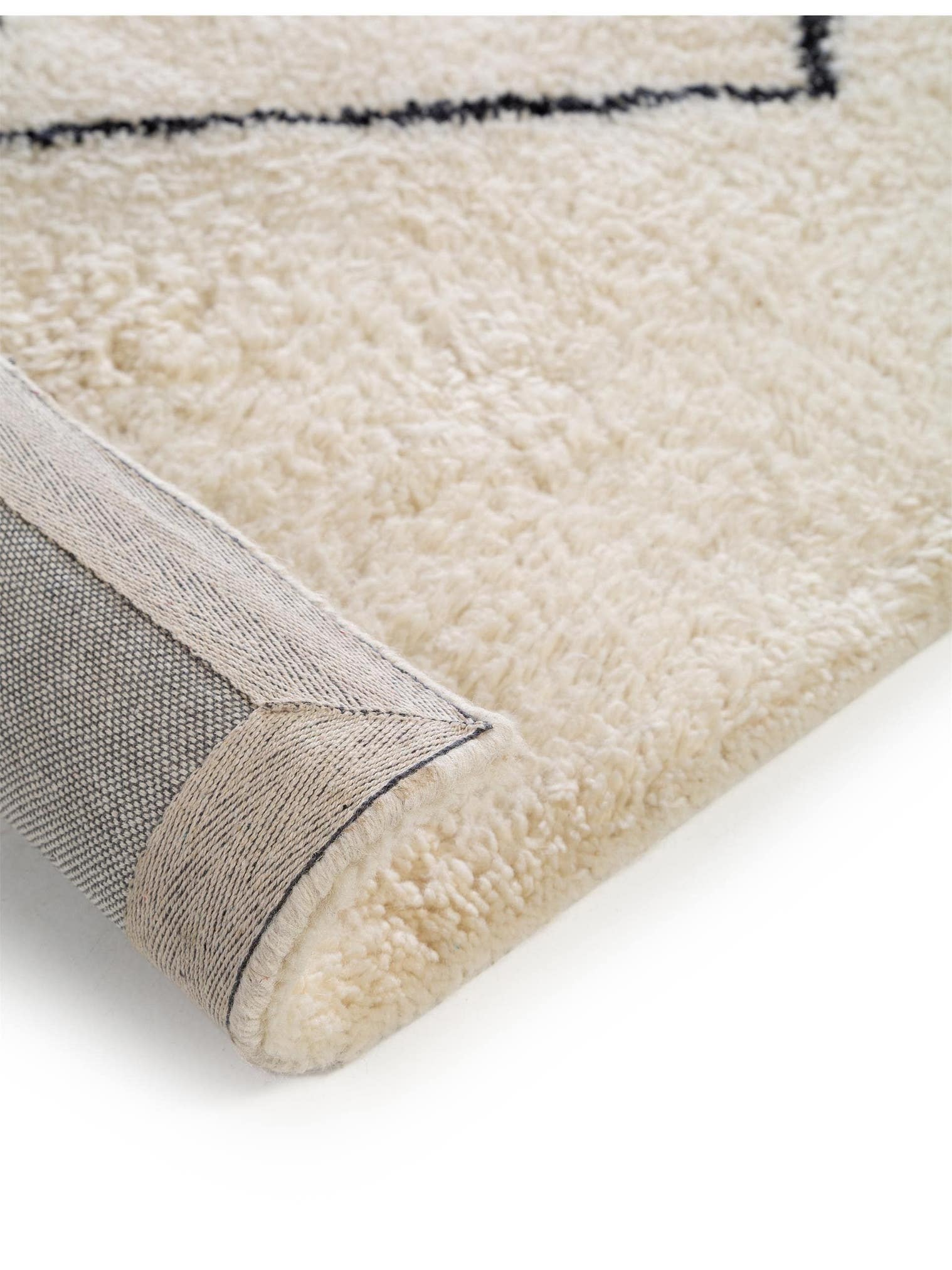 Rug made of 100% Wool in Beige with a 31 - 40 mm high pile by benuta Pure