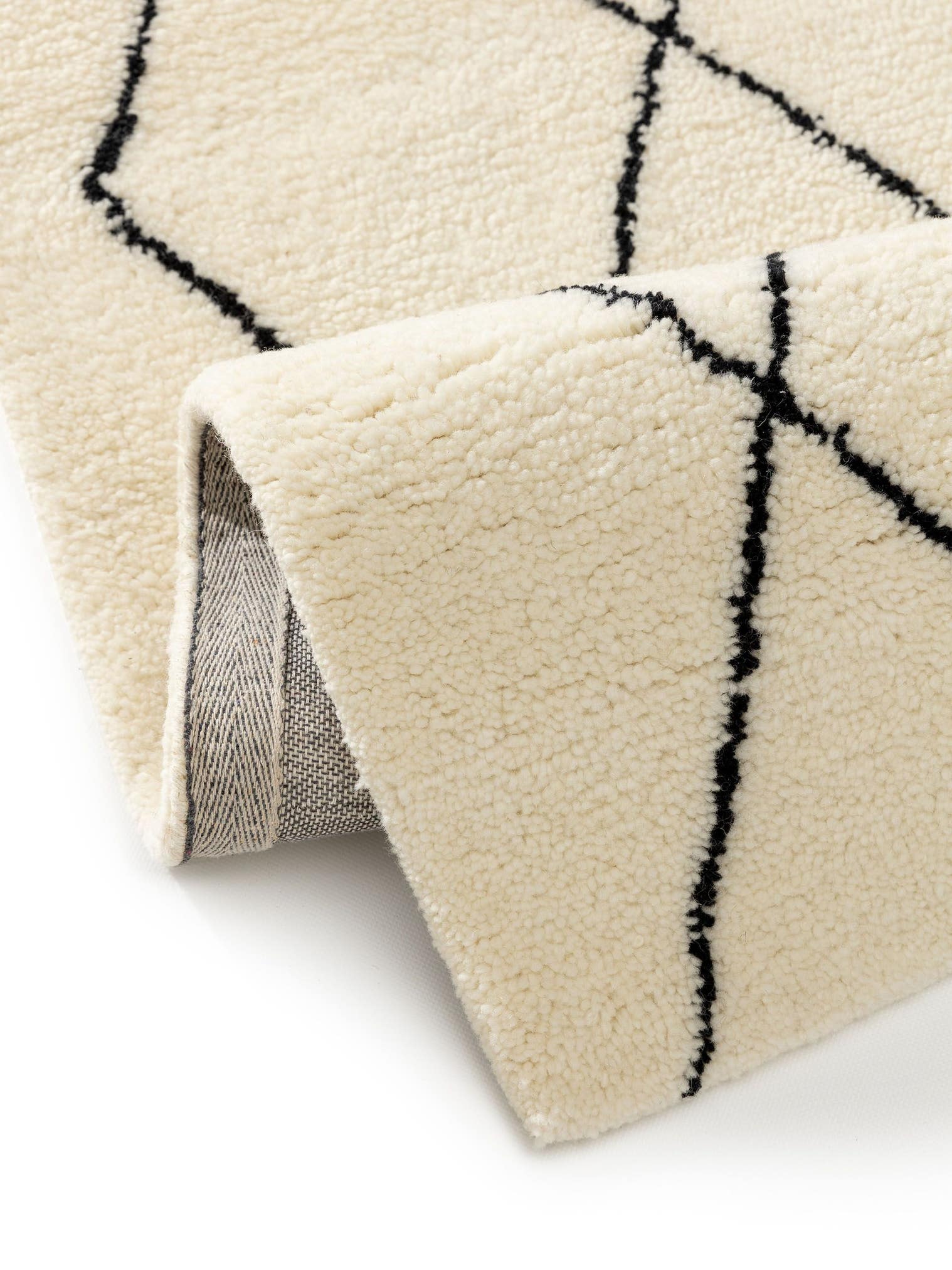Teppich aus 100% Wolle in Beige mit 31 bis 40 mm hohem Flor von benuta Pure