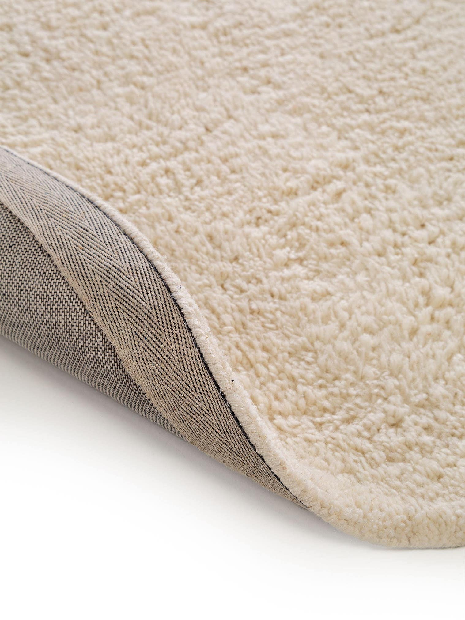 Teppich aus 100% Wolle in Weiß mit 31 bis 40 mm hohem Flor von benuta Pure