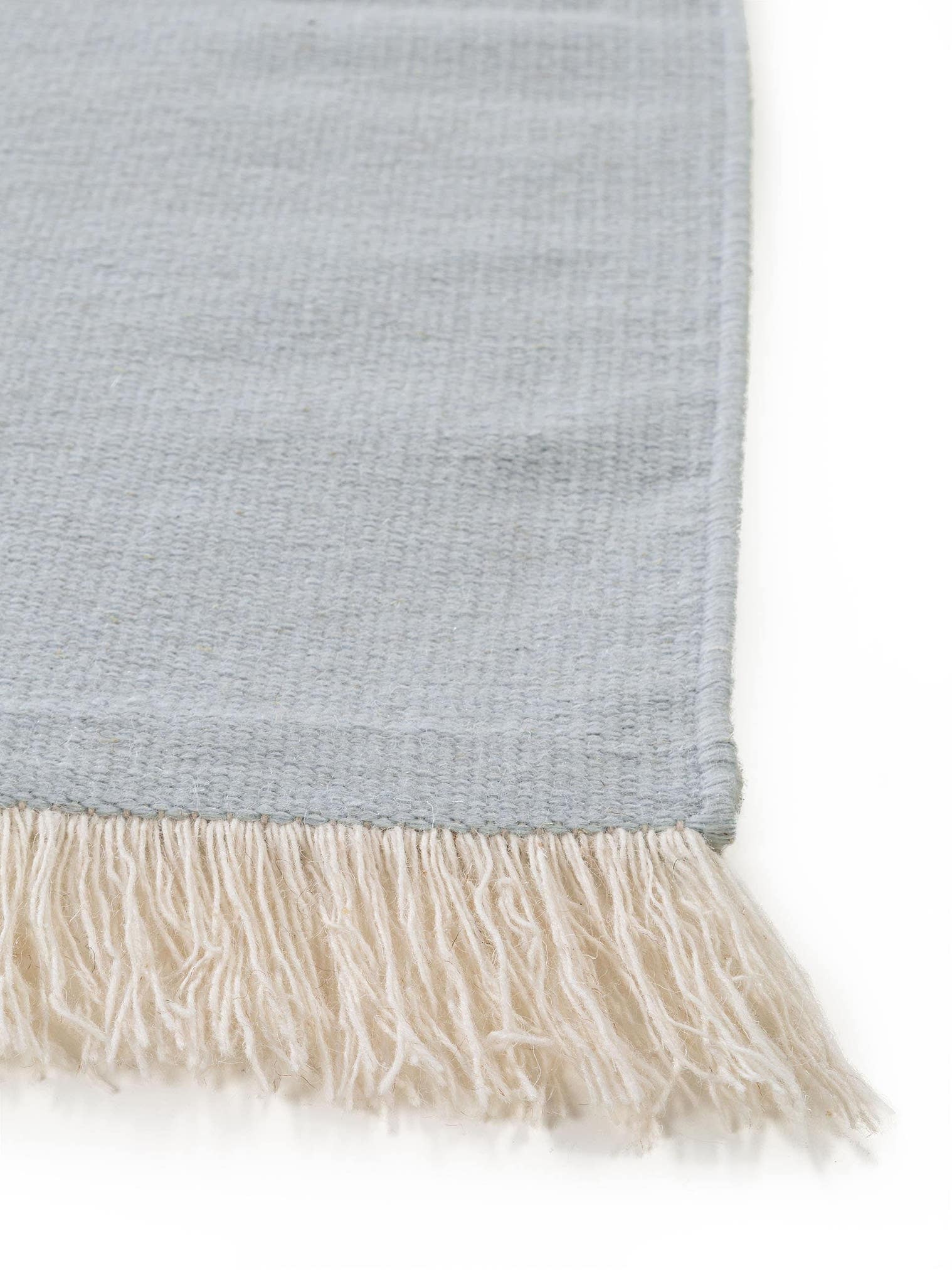Teppich aus 100% Wolle in Blau mit bis 5 mm hohem Flor von benuta Pop