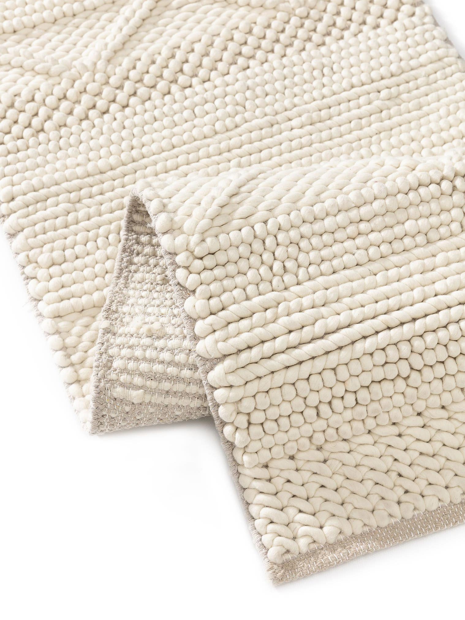 Teppich aus 100% Wolle in Beige mit 6 bis 10 mm hohem Flor von benuta Pure