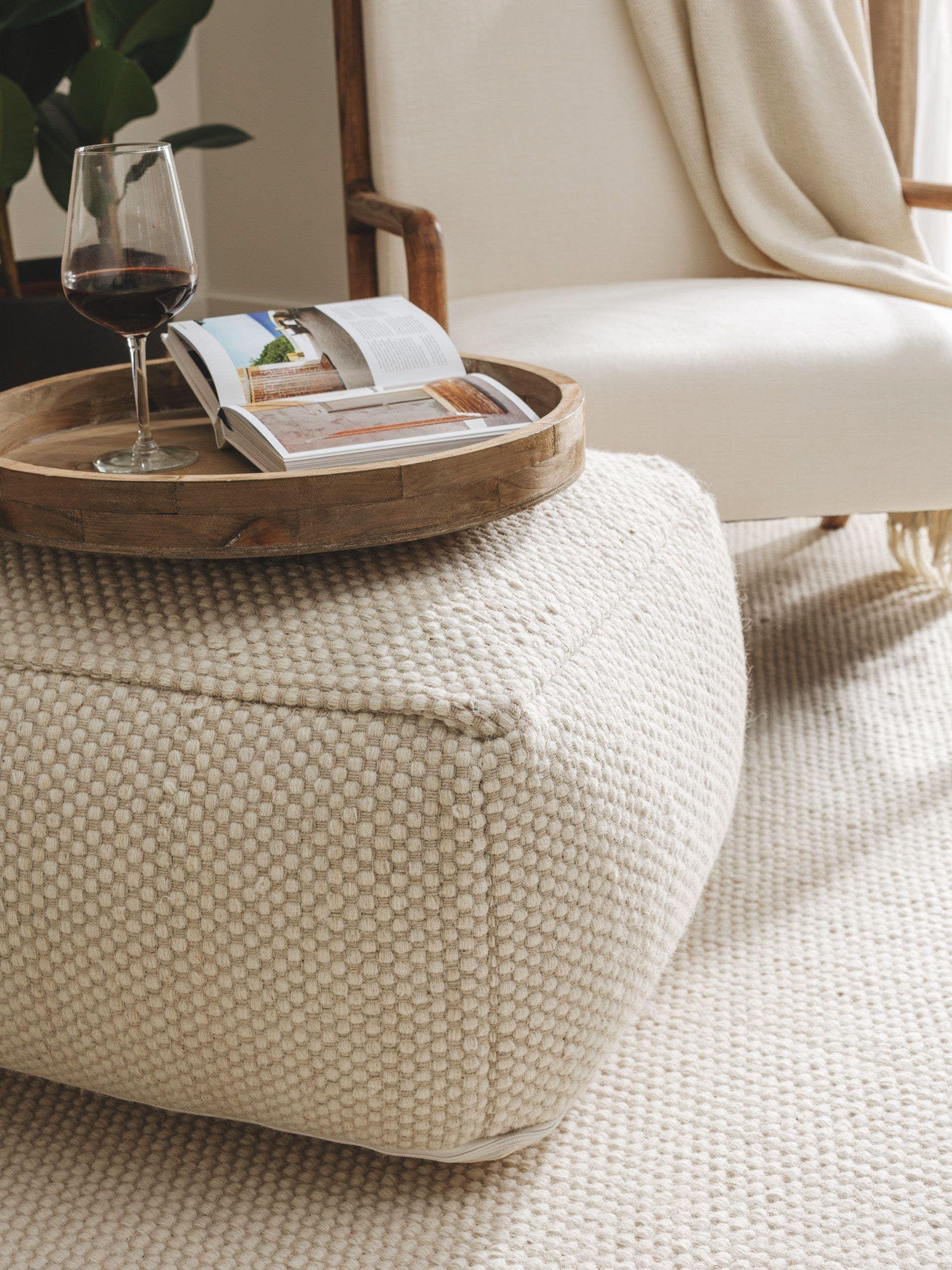 Handmade Wool Pouf Rocco White in Uni design made of 80% wool, 20% cotton by benuta Pure