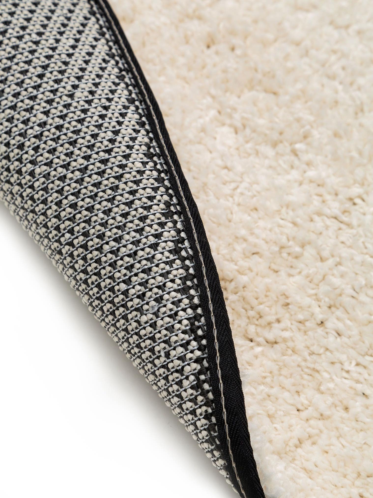 Teppich aus 100% Polypropylen in Schwarz/Weiß mit 21 bis 30 mm hohem Flor von Lytte