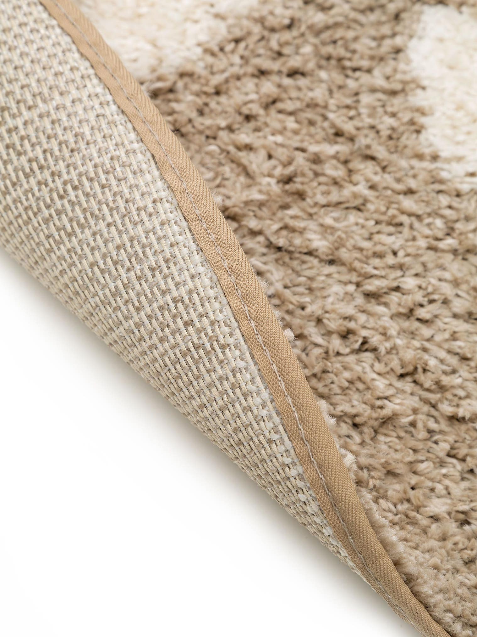 Teppich aus 100% Polypropylen in Beige mit 21 bis 30 mm hohem Flor von Lytte