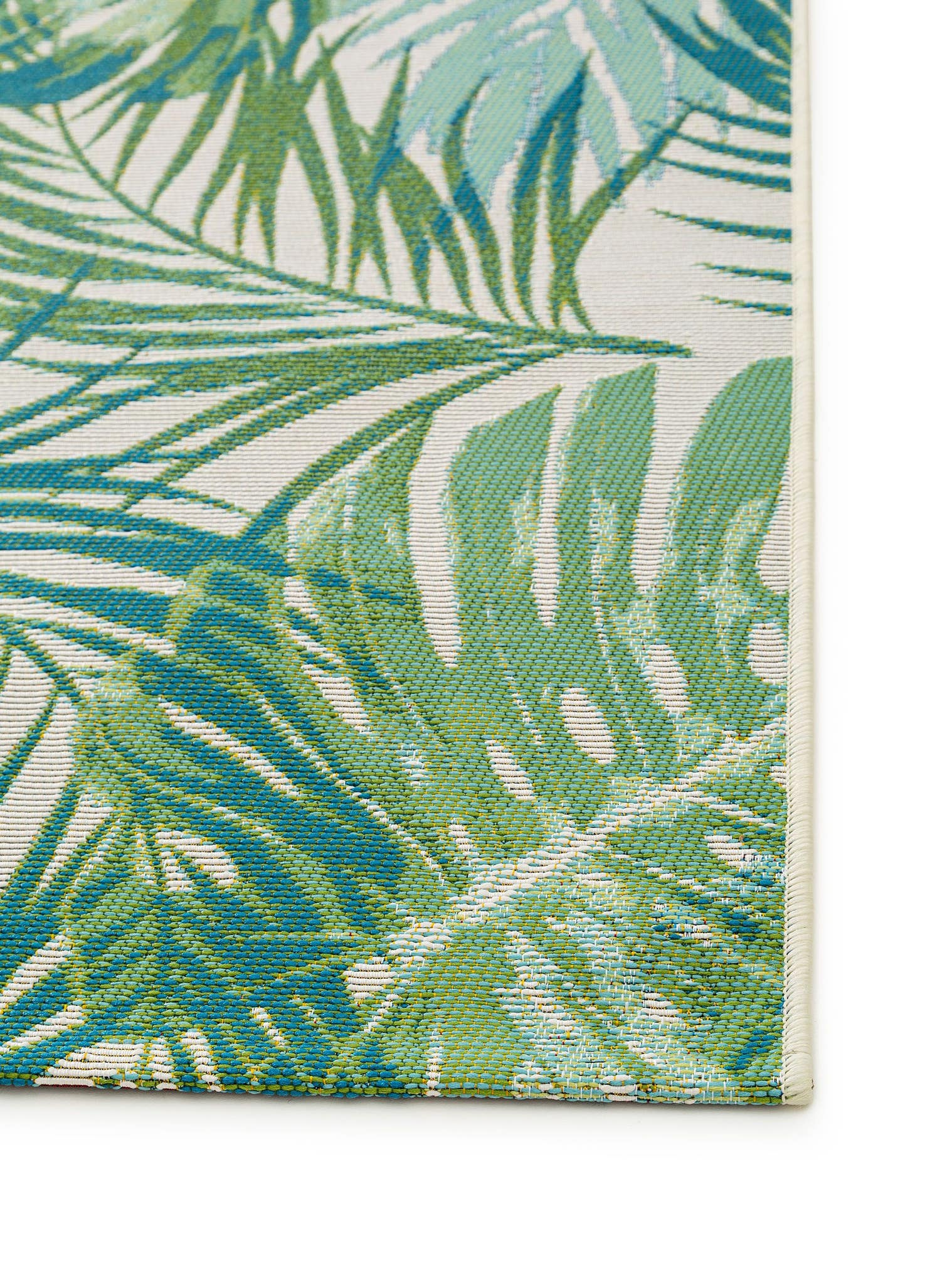 Teppich aus 76% Polypropylen, 23% Polyester, 1% Latex in Grün mit bis 5 mm hohem Flor von benuta Nest