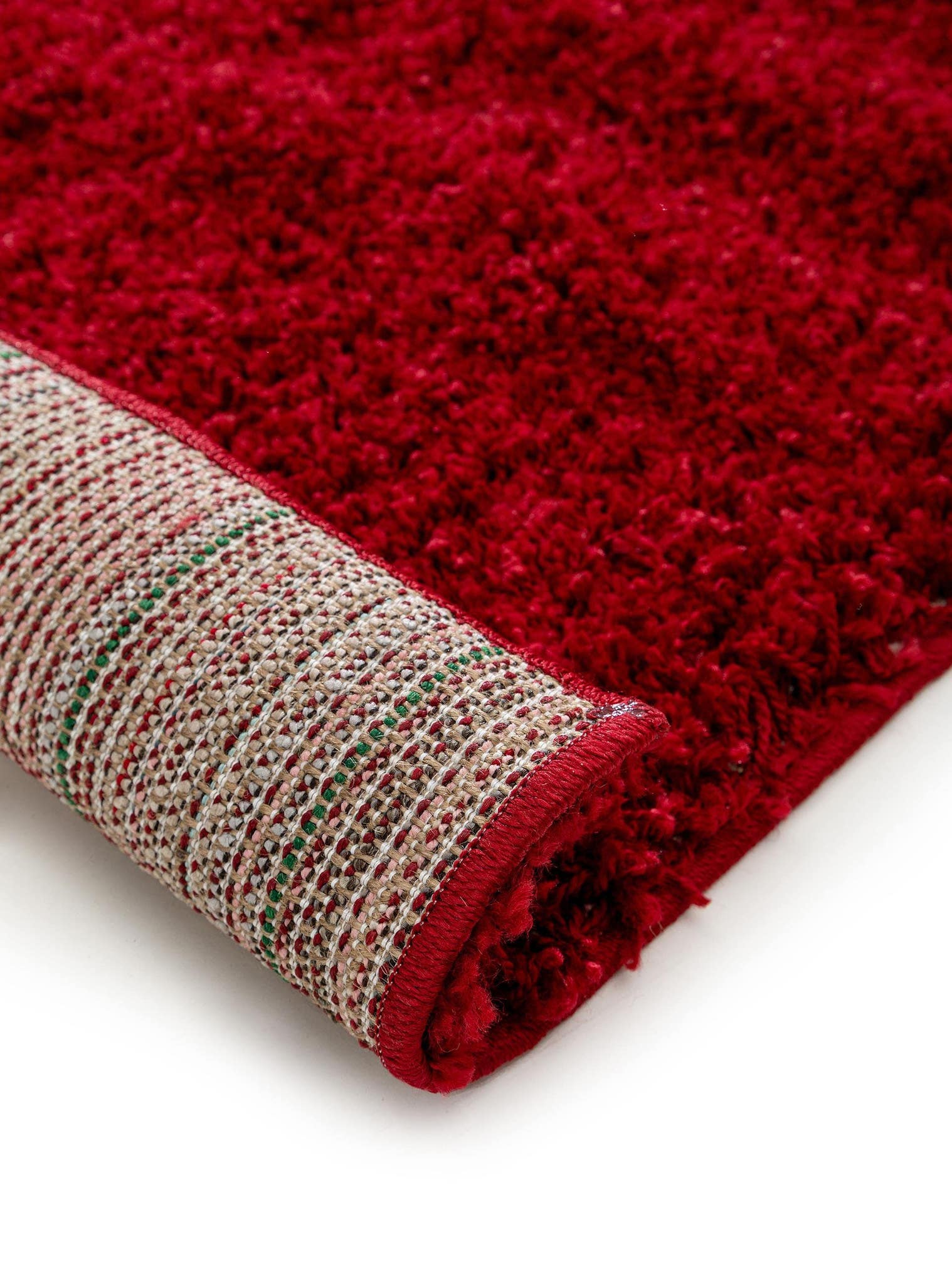 Teppich aus 100% Polypropylen in Rot mit 31 bis 40 mm hohem Flor von benuta Basic