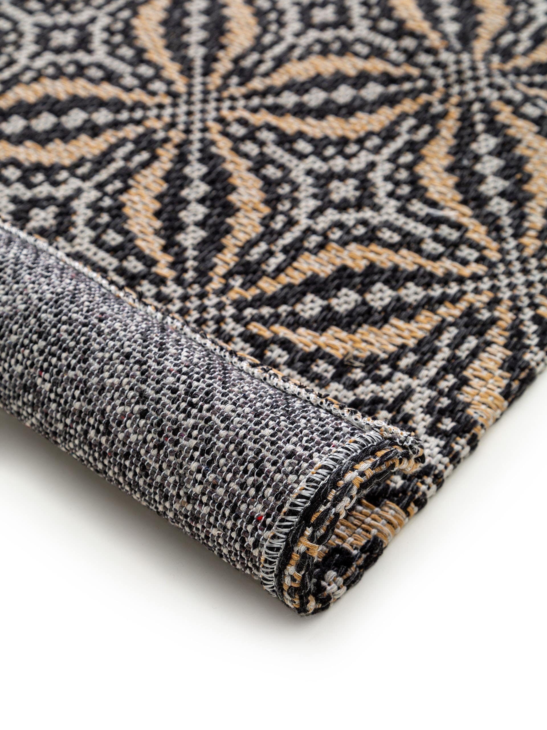 Rug made of 100% Cotton in Black with a 1- 5 mm high pile by benuta Nest
