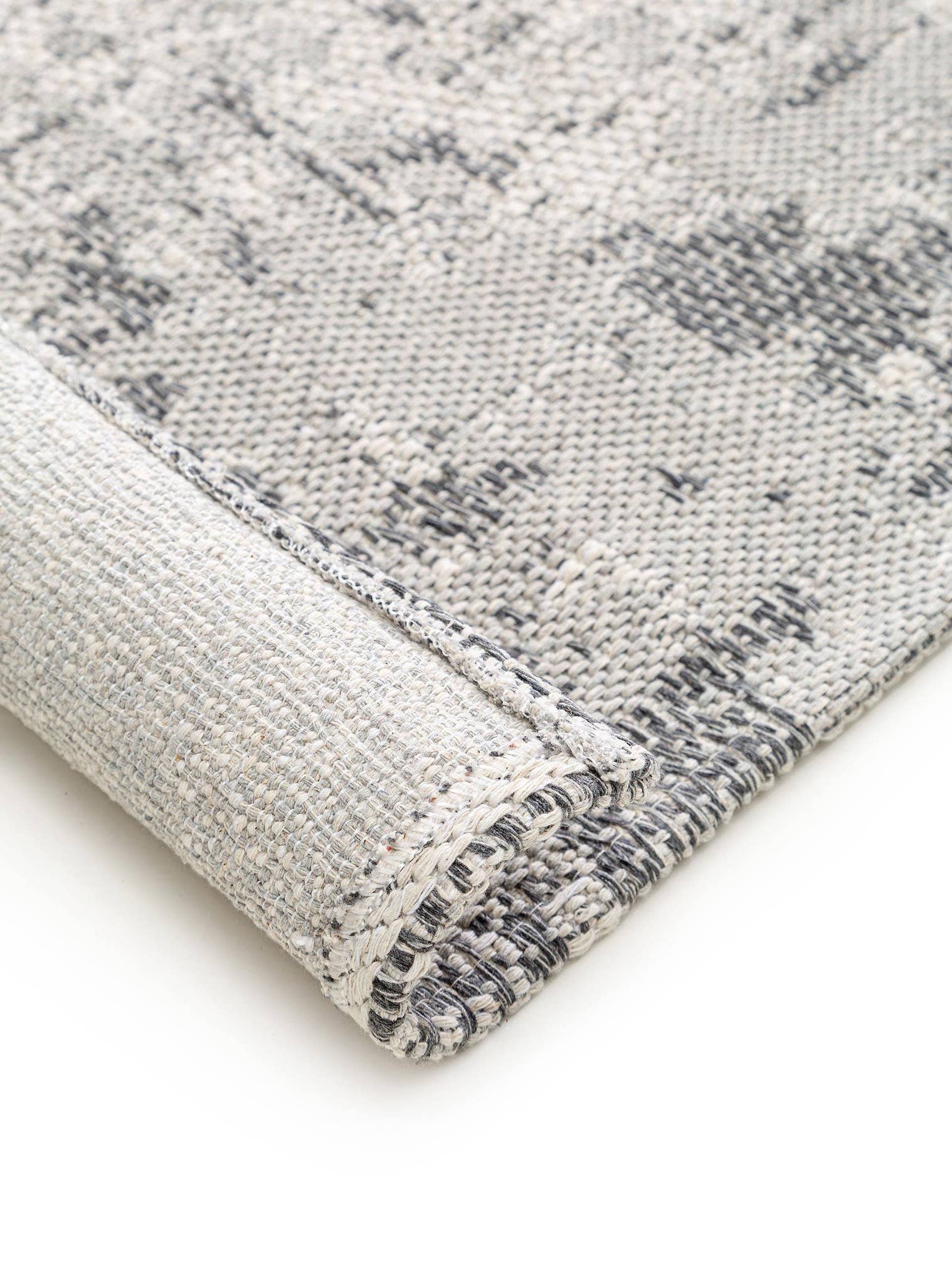 Teppich aus 100% Baumwolle in Grau mit bis 5 mm hohem Flor von benuta Nest