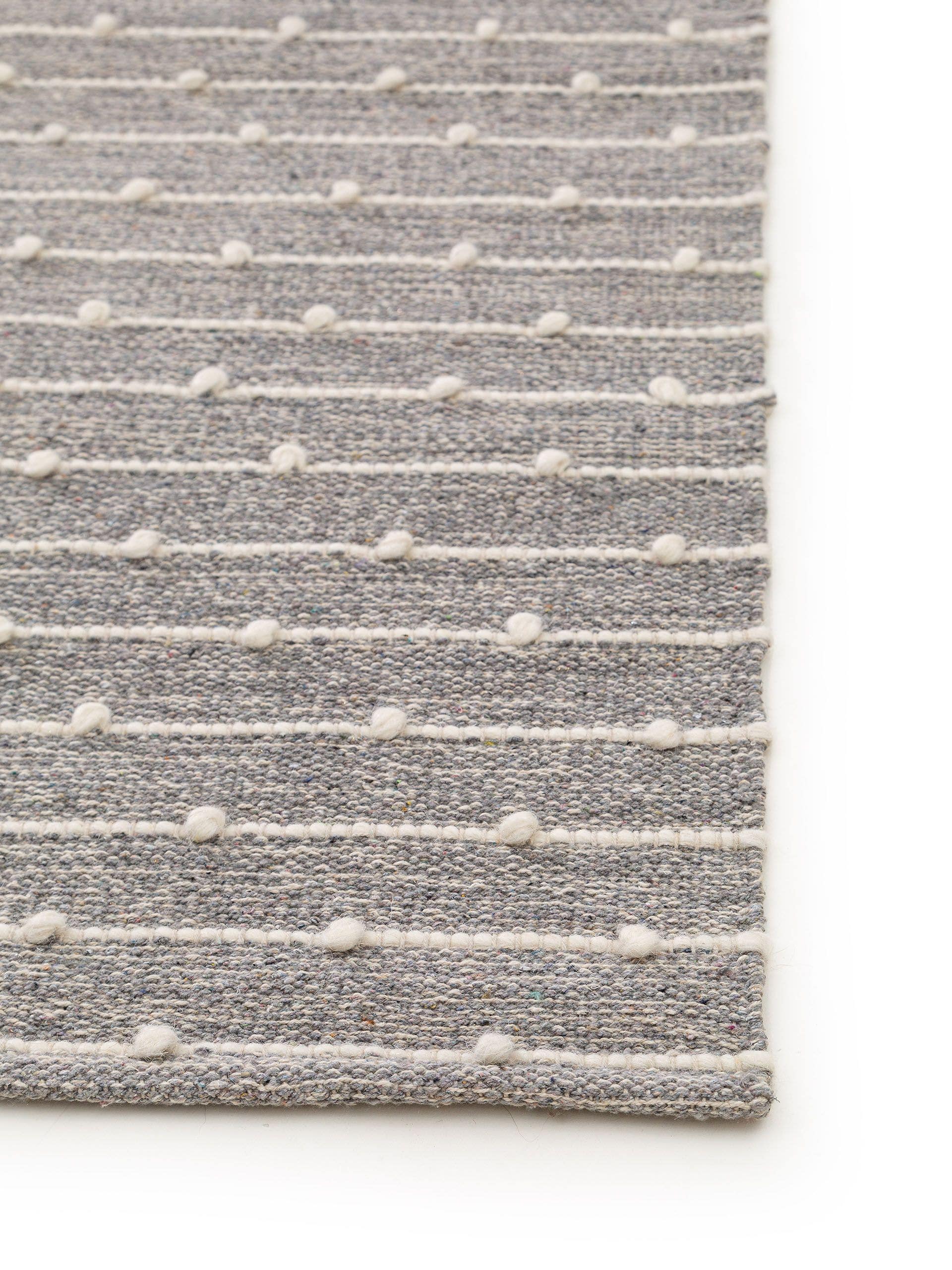Rug made of 80% cotton, 20% wool in Grey with a 1- 5 mm high pile by Lytte