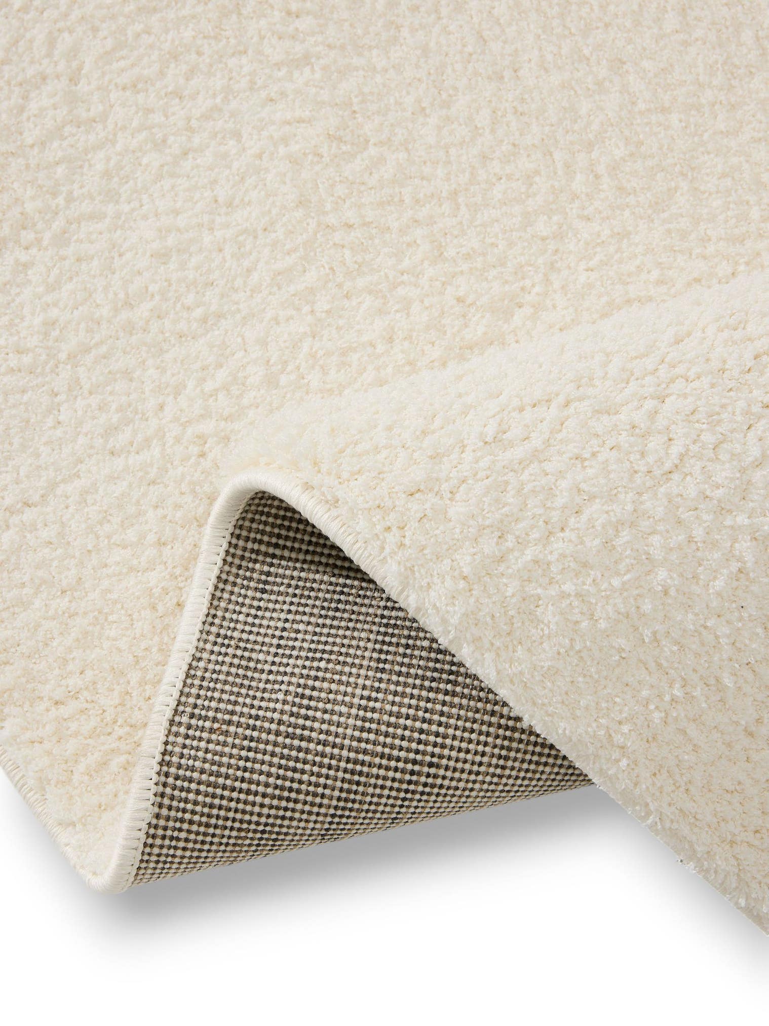 Teppich aus 100% Polyester (Mikrofaser) in Weiß mit 21 bis 30 mm hohem Flor von benuta Nest
