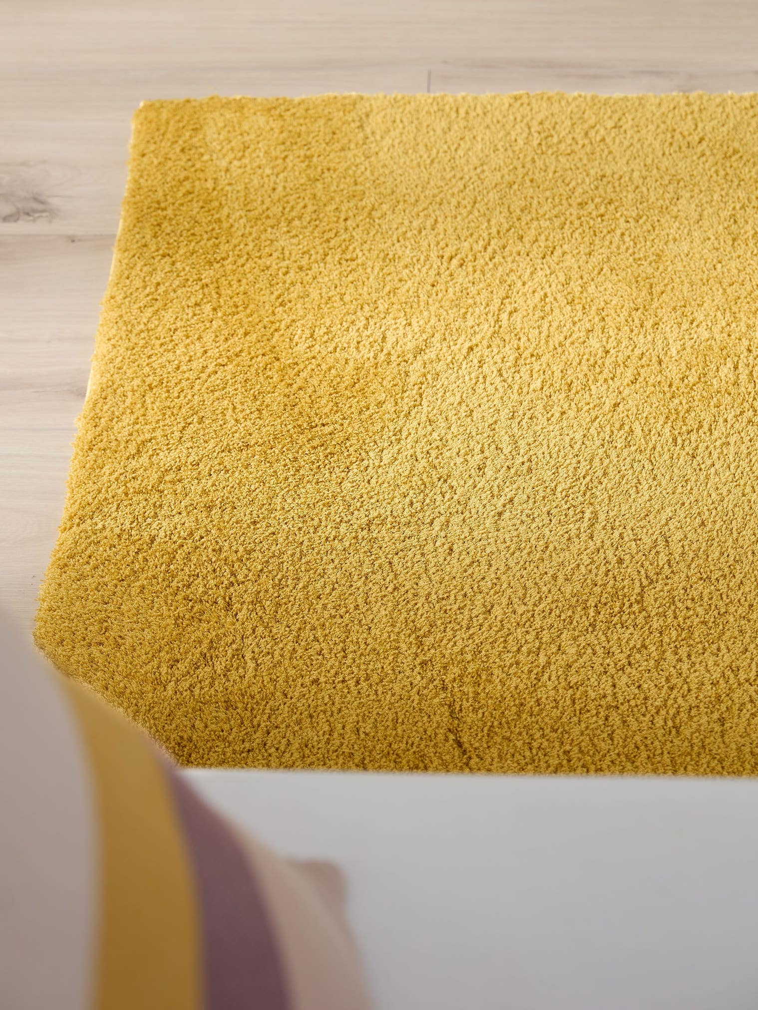Rug made of 100% Polyester in Yellow with a 31 - 40 mm high pile by benuta Nest