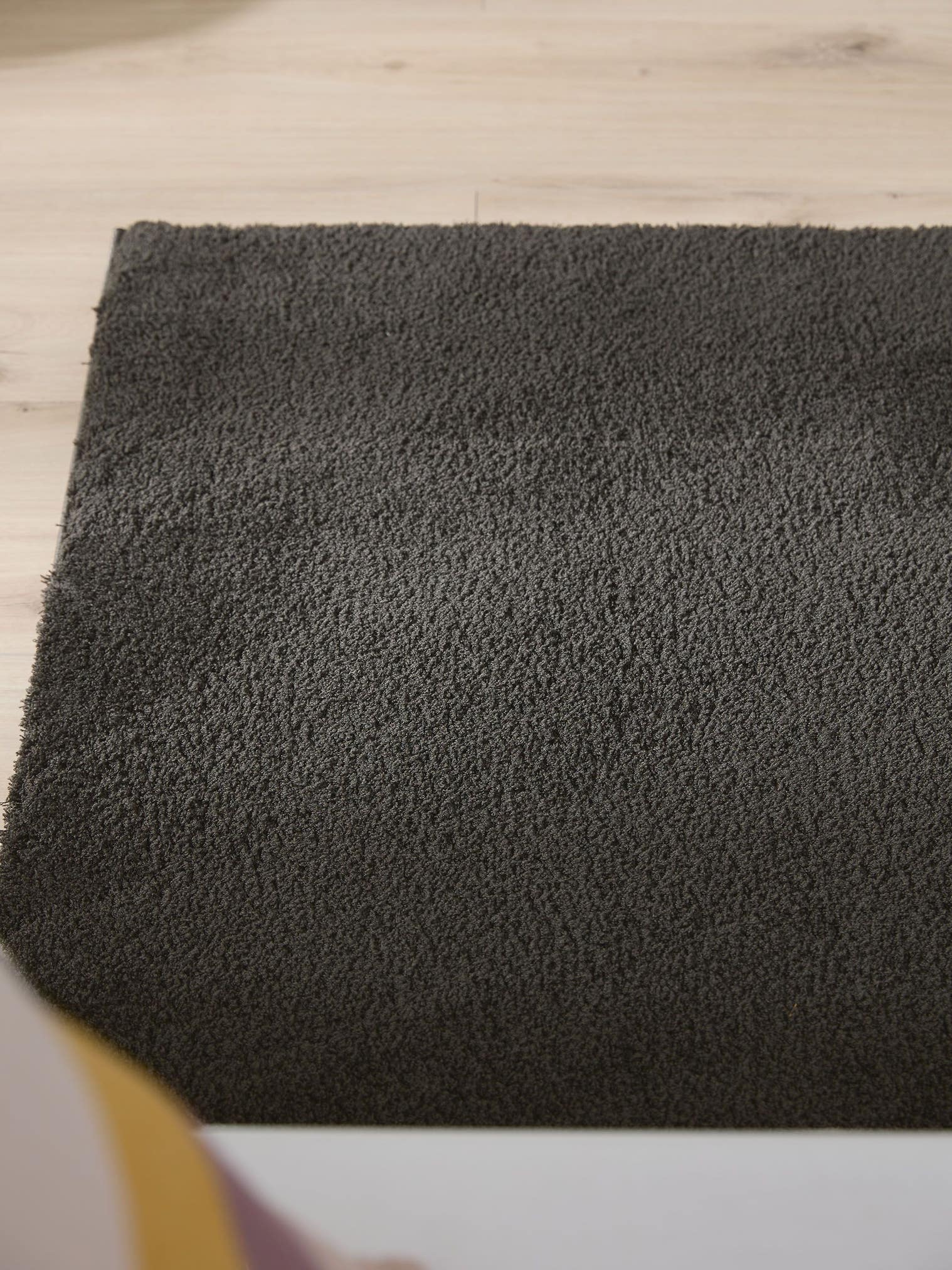 Rug made of 100% Polyester in Black with a 31 - 40 mm high pile by benuta Nest