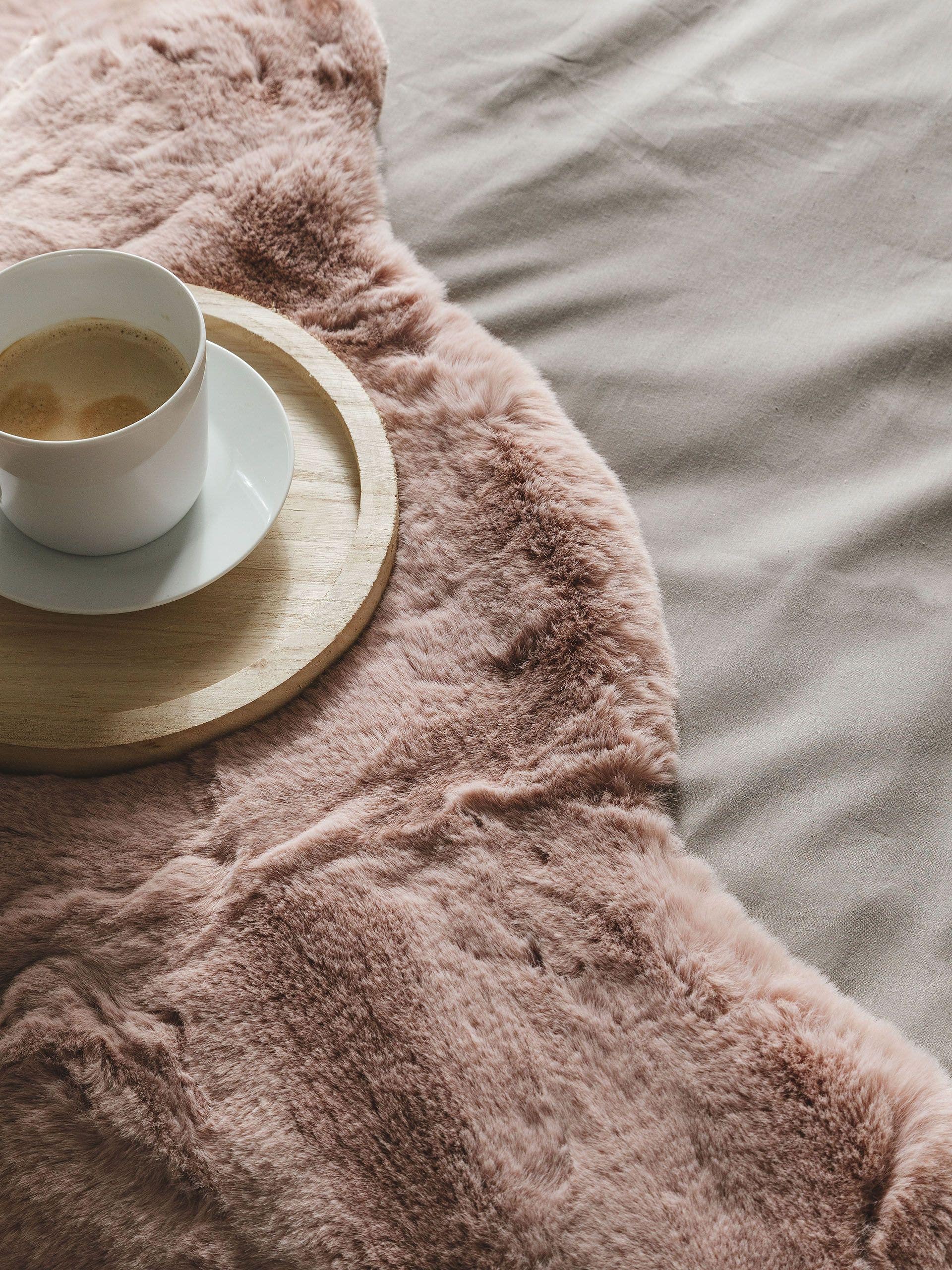 Faux fur pink rug hotsell