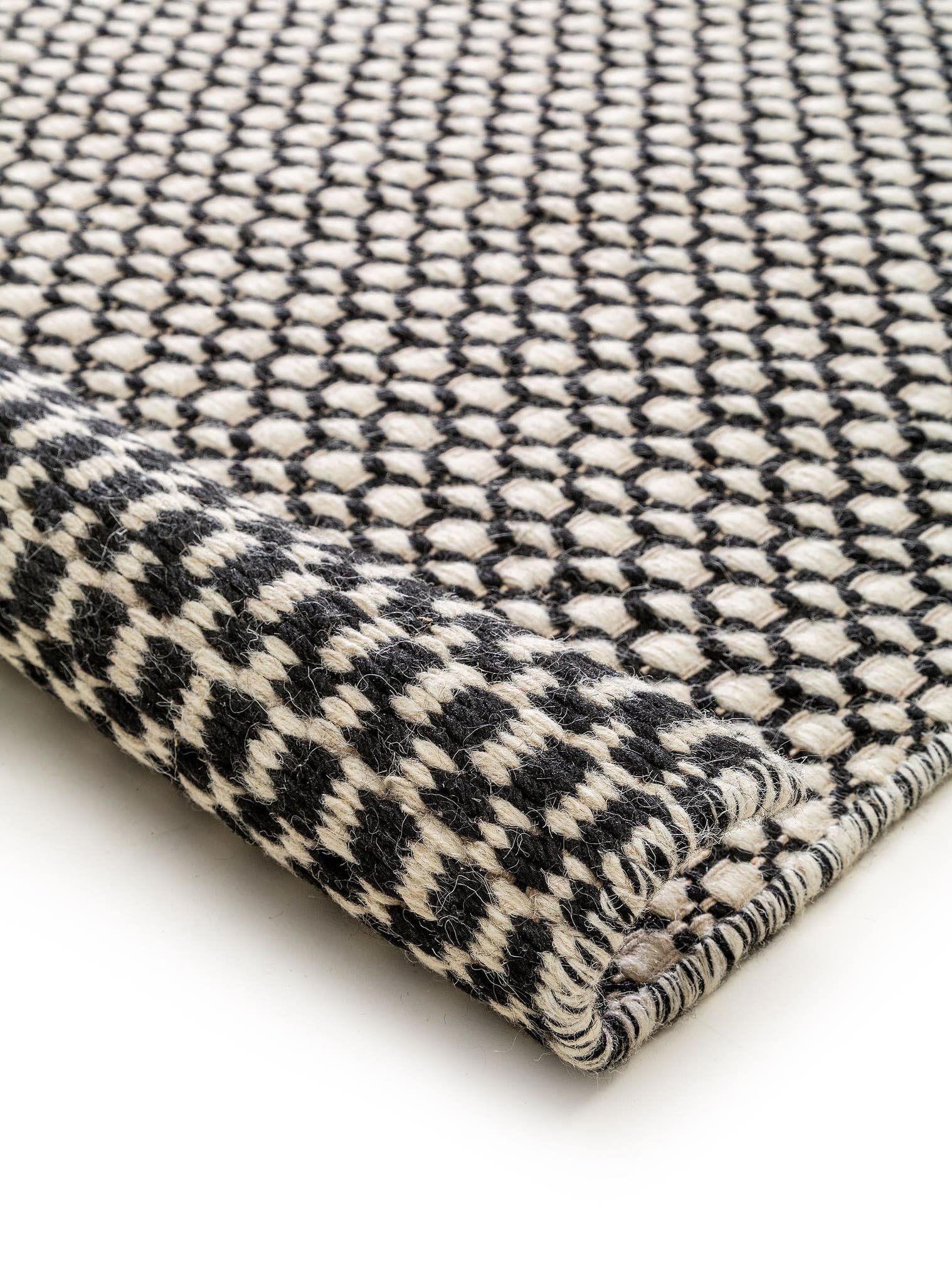 Teppich aus 80% Wolle, 20% Baumwolle in Beige mit 21 bis 30 mm hohem Flor von benuta Finest