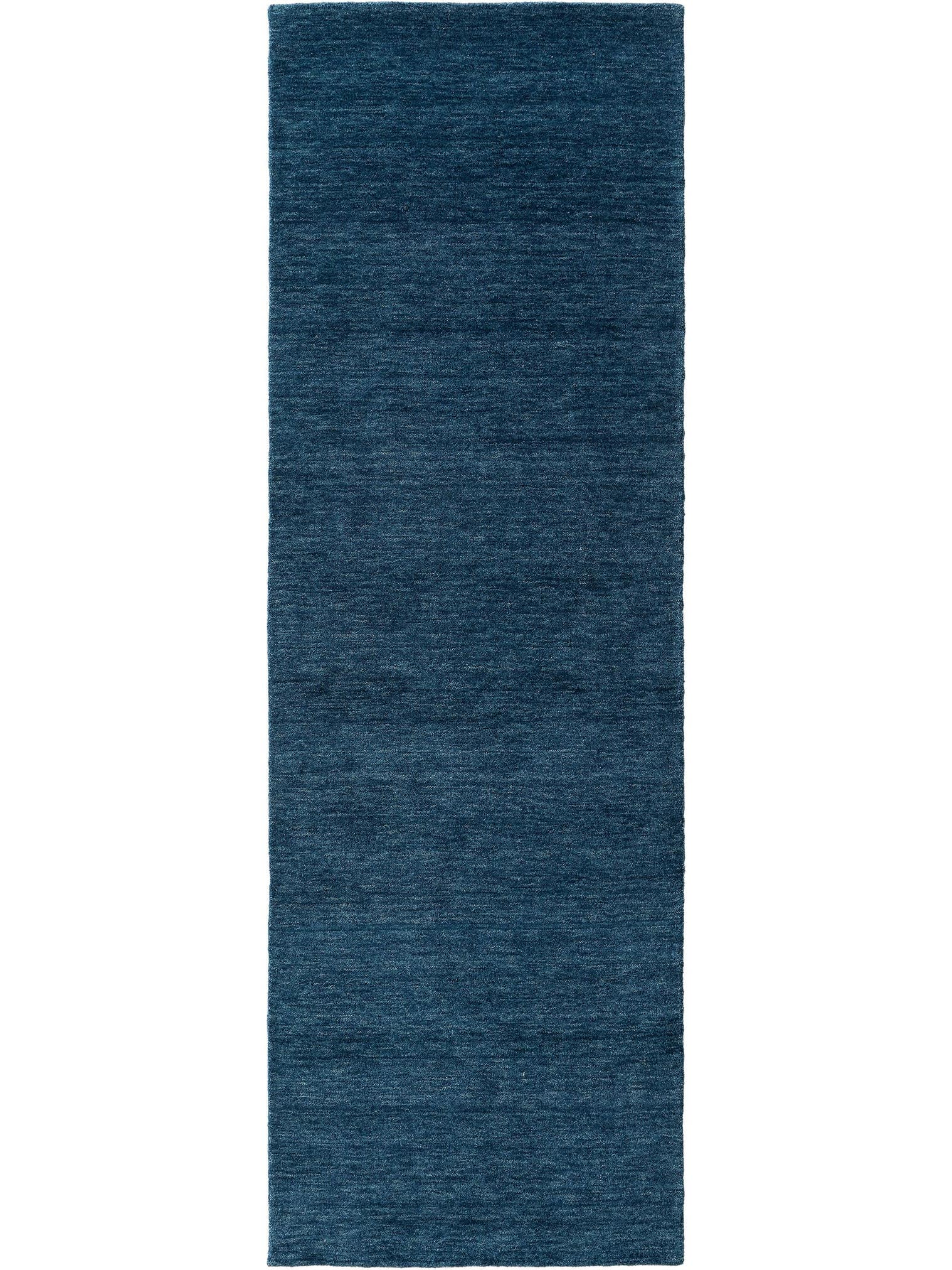 Teppich aus 100% Wolle in Blau mit 6 bis 10 mm hohem Flor von benuta Nest