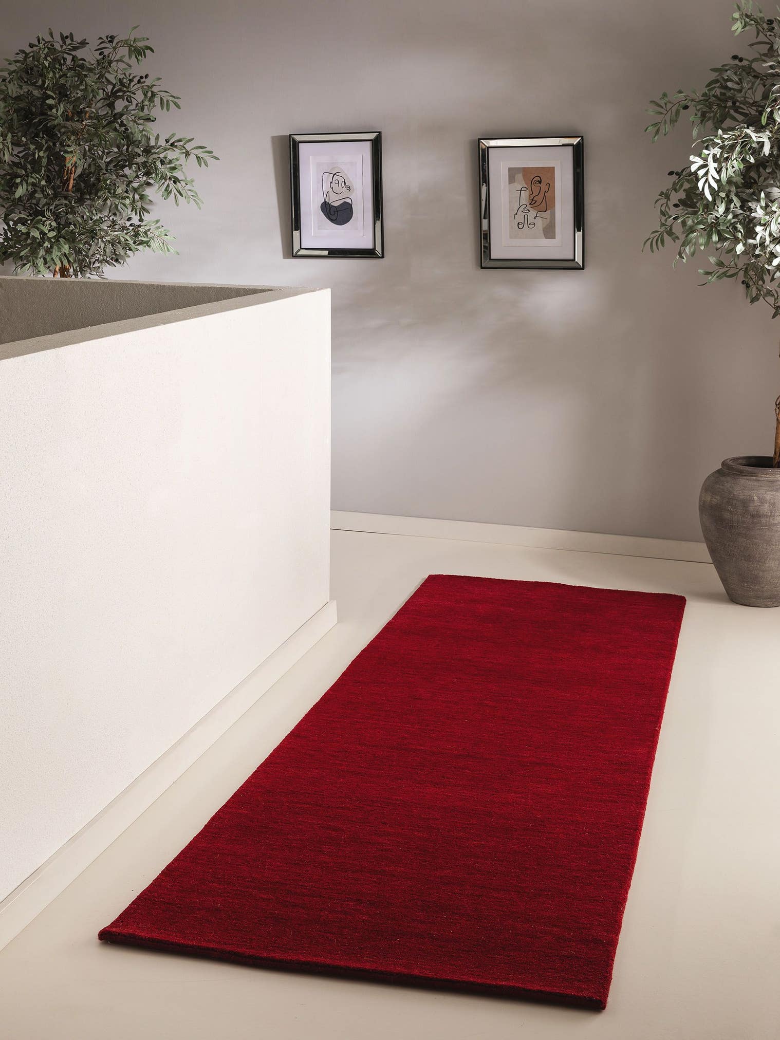 Rug made of 100% Wool in Red with a 6 - 10 mm high pile by benuta Nest