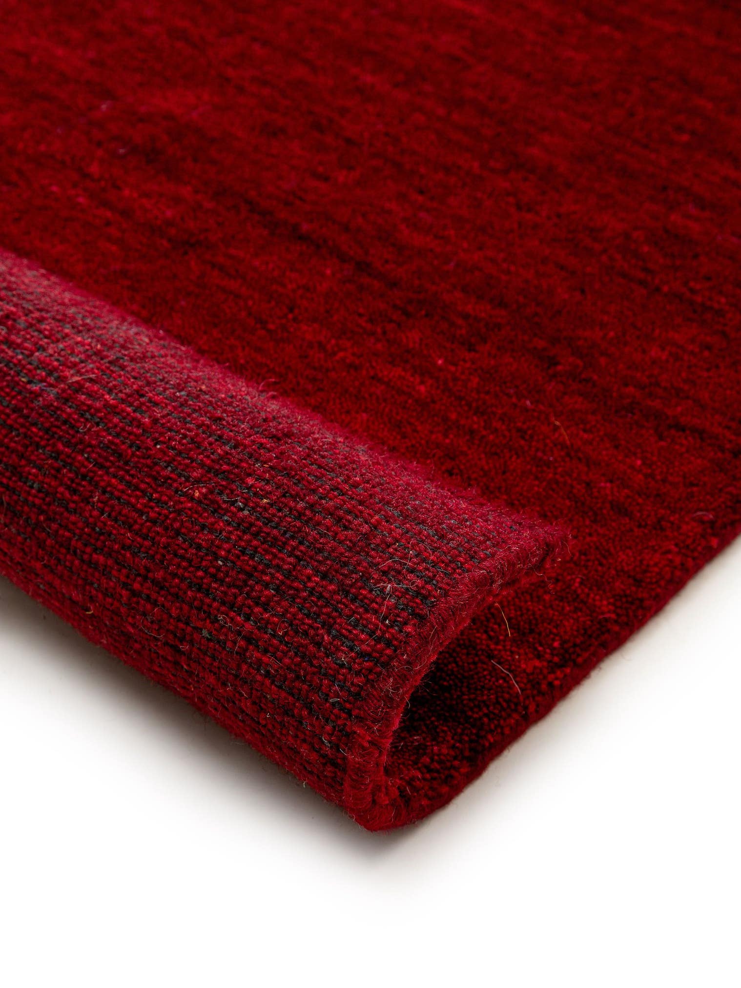 Rug made of 100% Wool in Red with a 6 - 10 mm high pile by benuta Nest