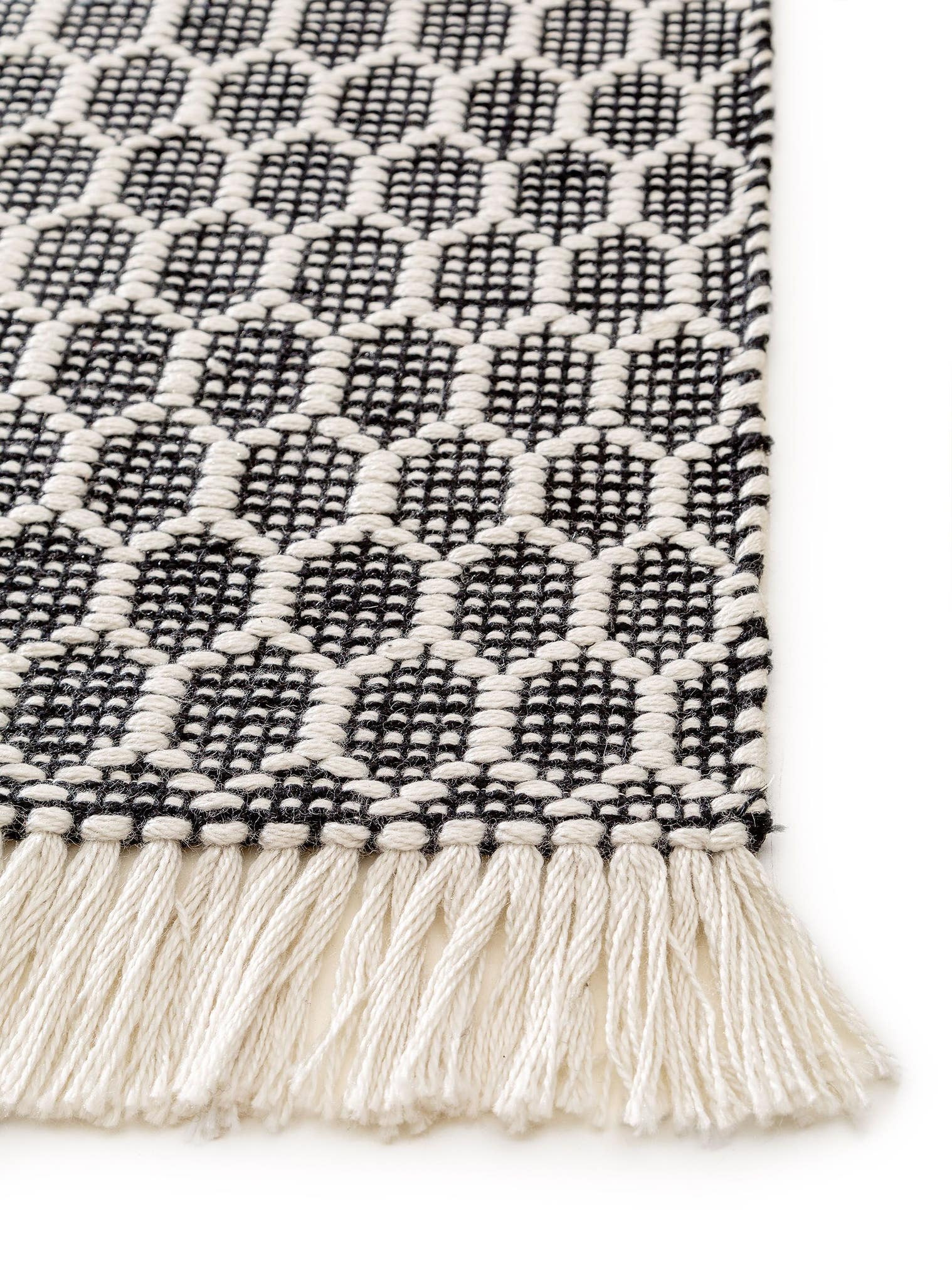 Teppich aus 100% Polyester (recyceltes PET) in Schwarz/Weiß mit bis 5 mm hohem Flor von benuta Pure