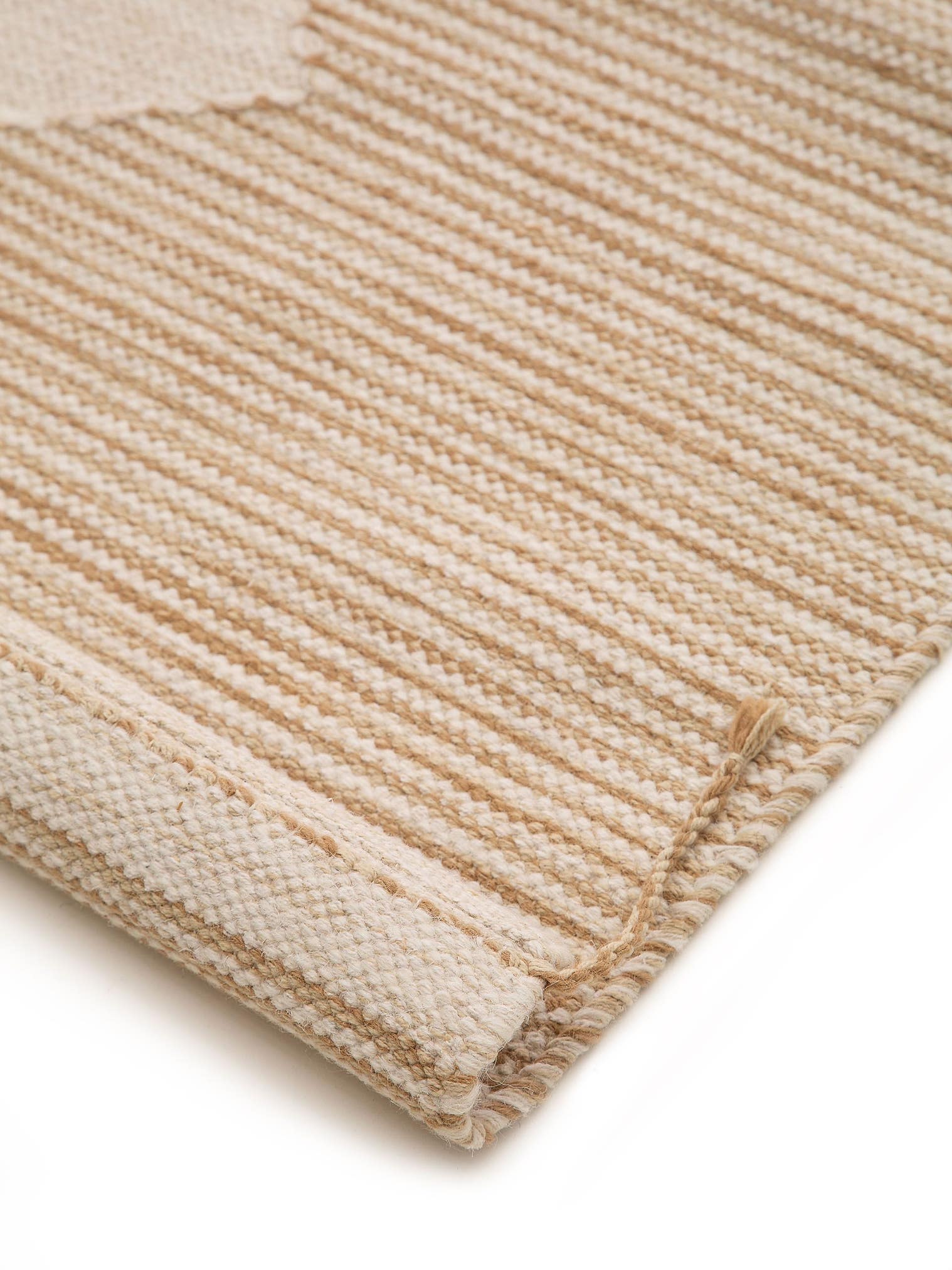 Teppich aus 50% Wolle, 50% Baumwolle in Beige mit bis 5 mm hohem Flor von benuta Pure