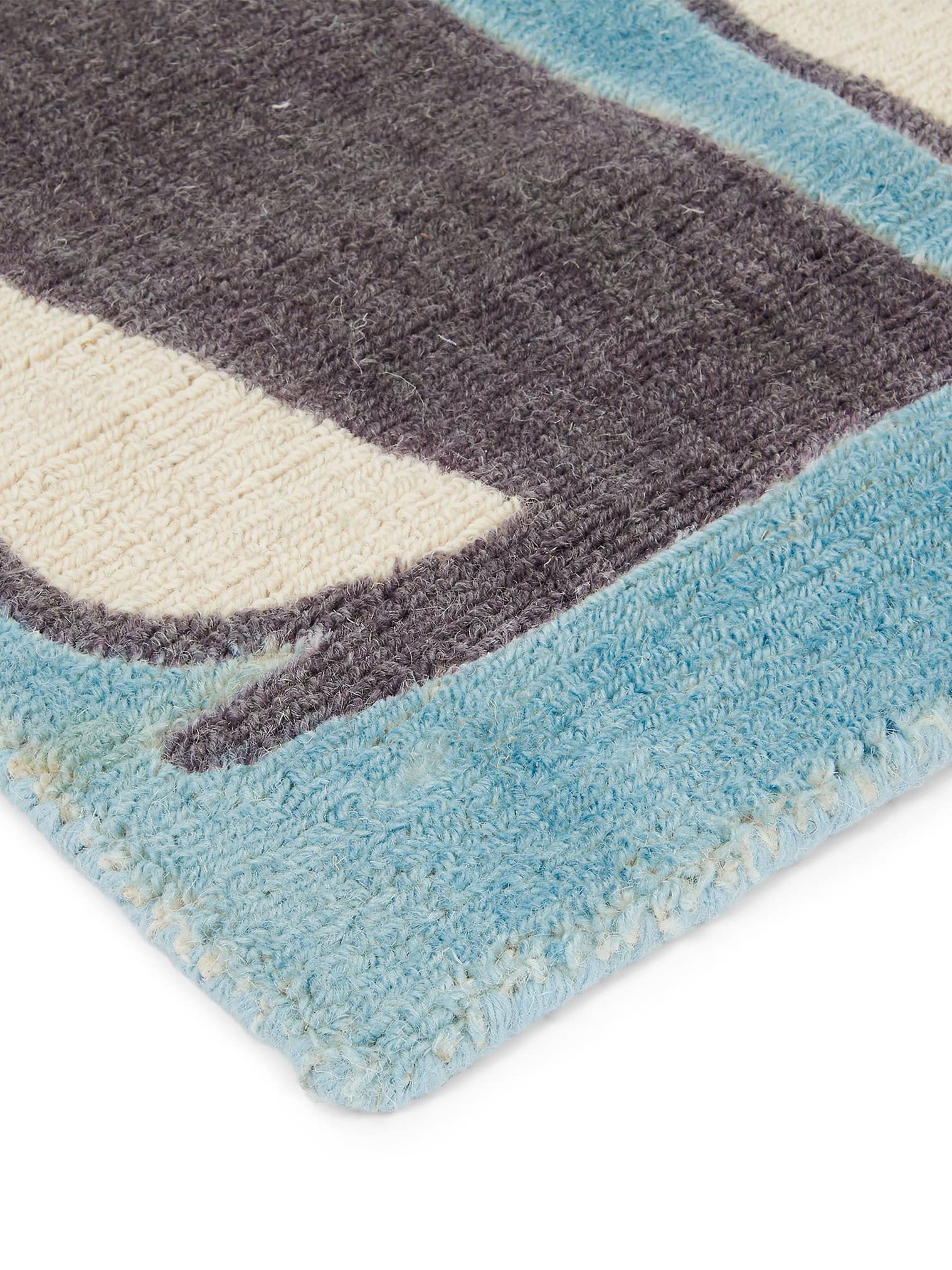 Teppich aus 100% Wolle in Blau mit 11 bis 20 mm hohem Flor von Scion