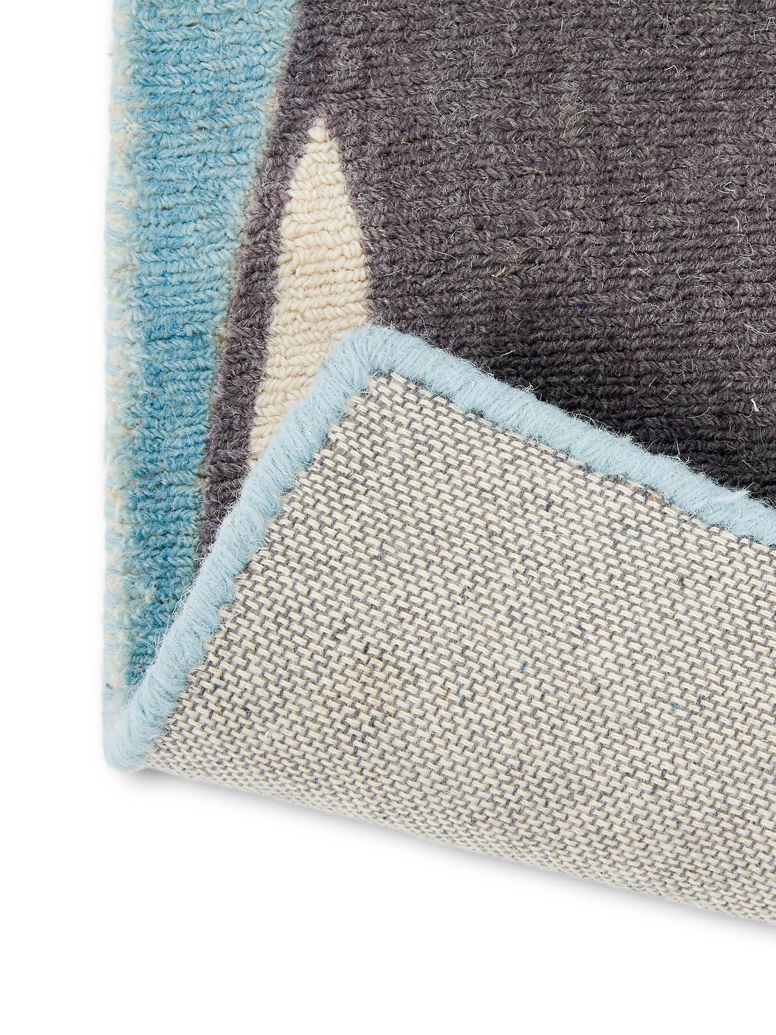 Teppich aus 100% Wolle in Blau mit 11 bis 20 mm hohem Flor von Scion