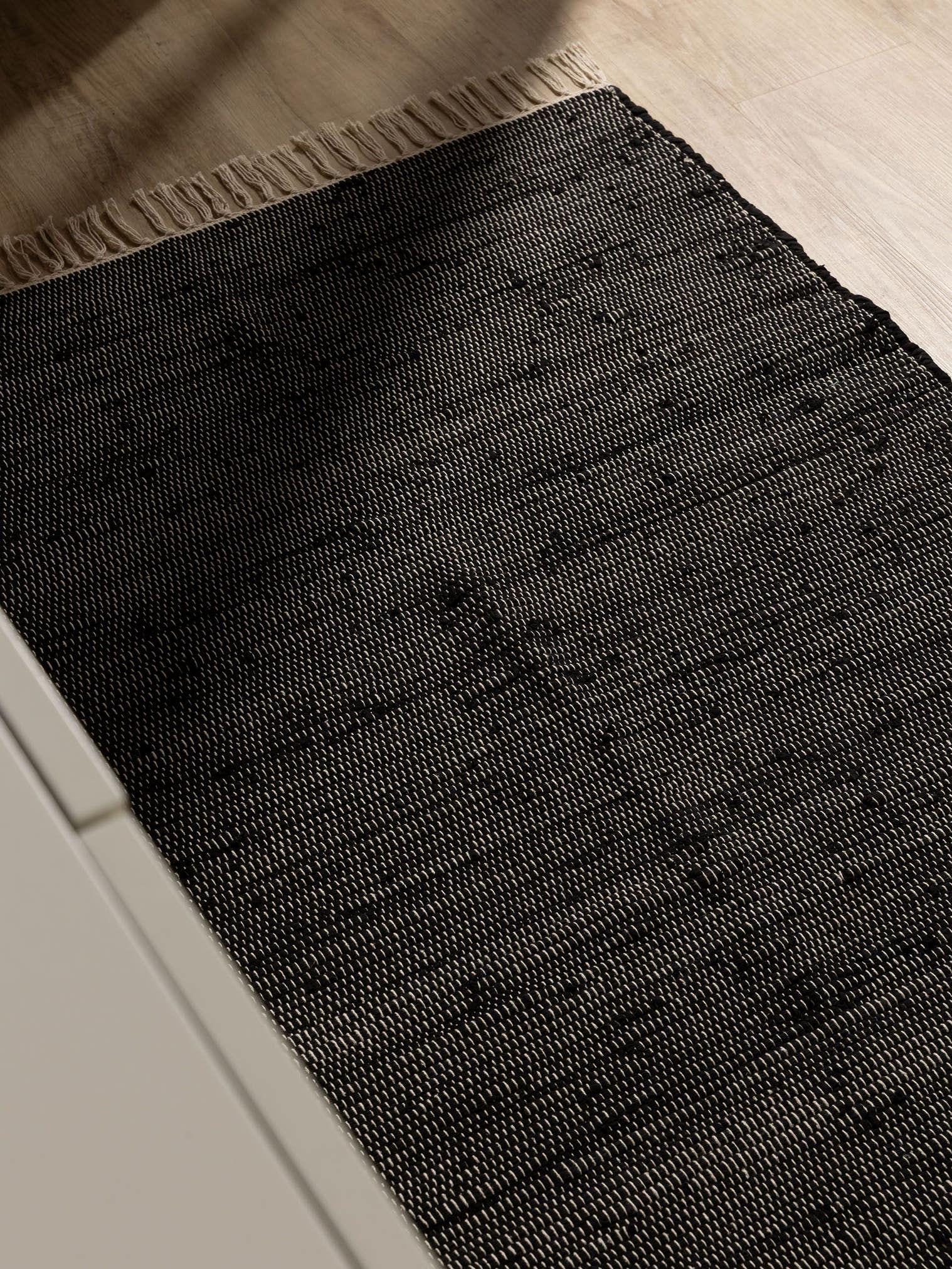 Rug made of 100% Cotton (recycled) in Black with a 1- 5 mm high pile by benuta Basic