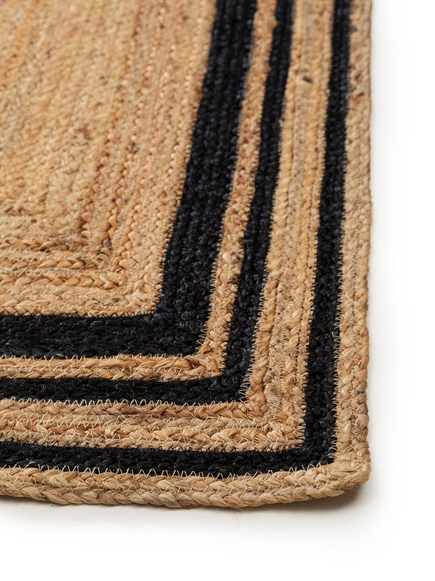 Rug made of 100% Jute in Black with a 1- 5 mm high pile by benuta Pure