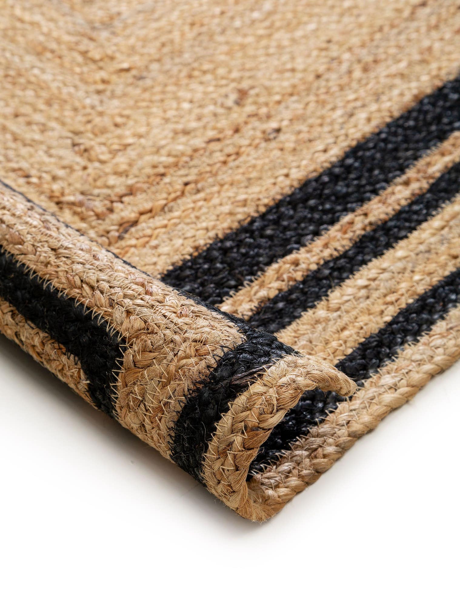 Rug made of 100% Jute in Black with a 1- 5 mm high pile by benuta Pure